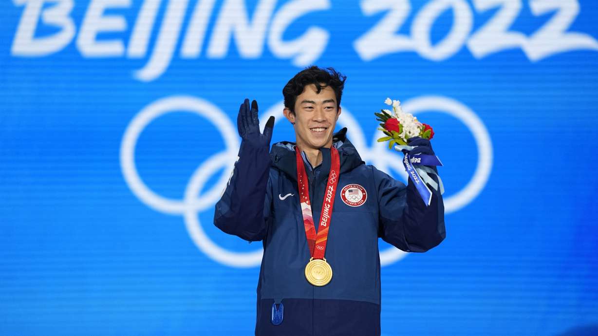 Gold medalist Nathan Chen of the United States celebrates during the medal ceremony for the men’s free skate at the 2022 Winter Olympics, Feb. 10, 2022, in Beijing. Chen says bringing the Winter Games back to Salt Lake City just "makes a lot of sense."