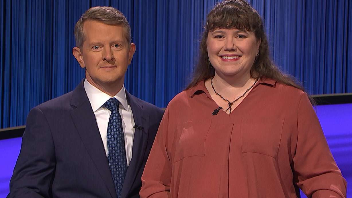 Suzanne Zgraggen is pictured with “Jeopardy!” host Ken Jennings. Zgraggen, a BYU graduate who works in the Hogle Zoo’s education department, competed on the Jan. 10 episode of “Jeopardy!”