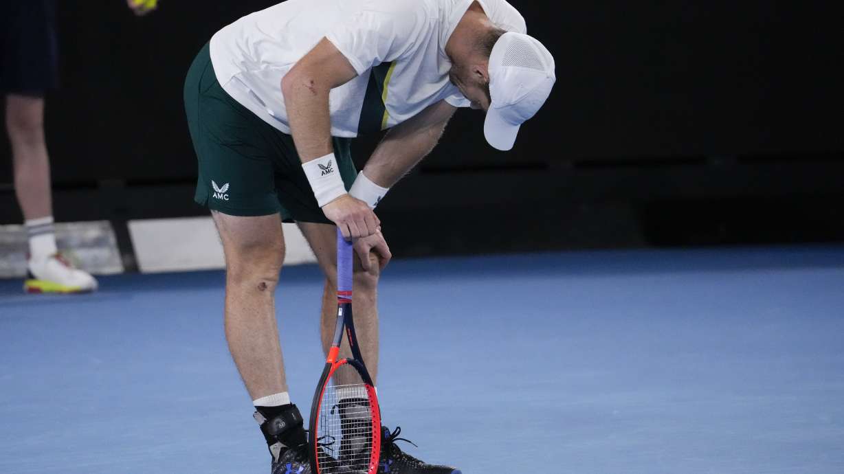 Andy Murray of Britain reacts after losing a point to Thanasi Kokkinakis of Australia during their second round match at the Australian Open tennis championship in Melbourne, Australia, Thursday, Jan. 19, 2023.