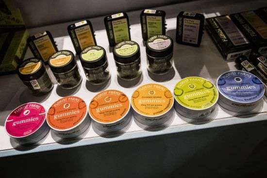 Flavored cannabis gummies are displayed in a cabinet at the Housing Works Cannabis Co., New York's first legal cannabis dispensary, Dec. 29, 2022, in New York. As New York opens more legal outlets for recreational marijuana, some public health advocates want more scrutiny on how marijuana products are being marketed to teens and young adults.