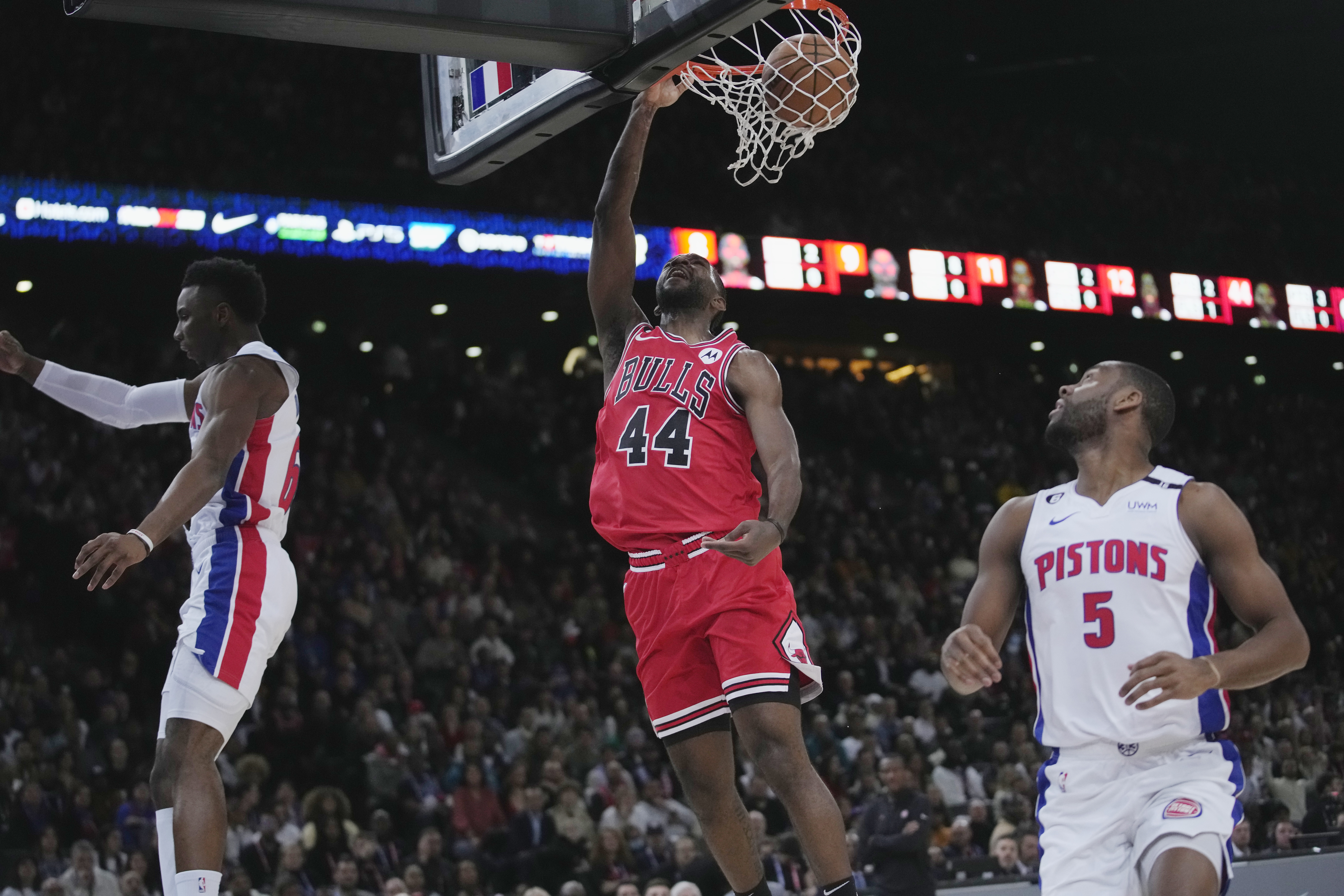 Chicago Bulls Partrick Williams, centre, dunks during the NBA basketball game between Chicago Bulls and Detroit Pistons at the Accor Arena in Paris, Thursday, Jan. 19, 2023.