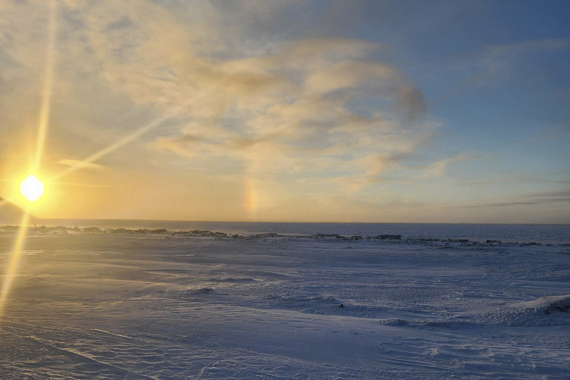 The view from the front of the school in Wales, Alaska, where a 24-year-old woman and her 1-year-old son were killed in an encounter with a polar bear on Tuesday, is seen in this photo taken on Sunday, by Chrissy Friberg, a traveling optician who was providing services in the village. 