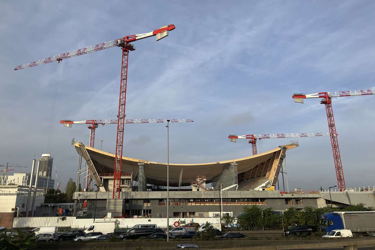 The aquatic center that will host the artistic swimming, water polo and diving competitions for the Paris Olympic Games in 2024 is under construction in Saint-Denis, north of Paris, on Oct. 19, 2022.