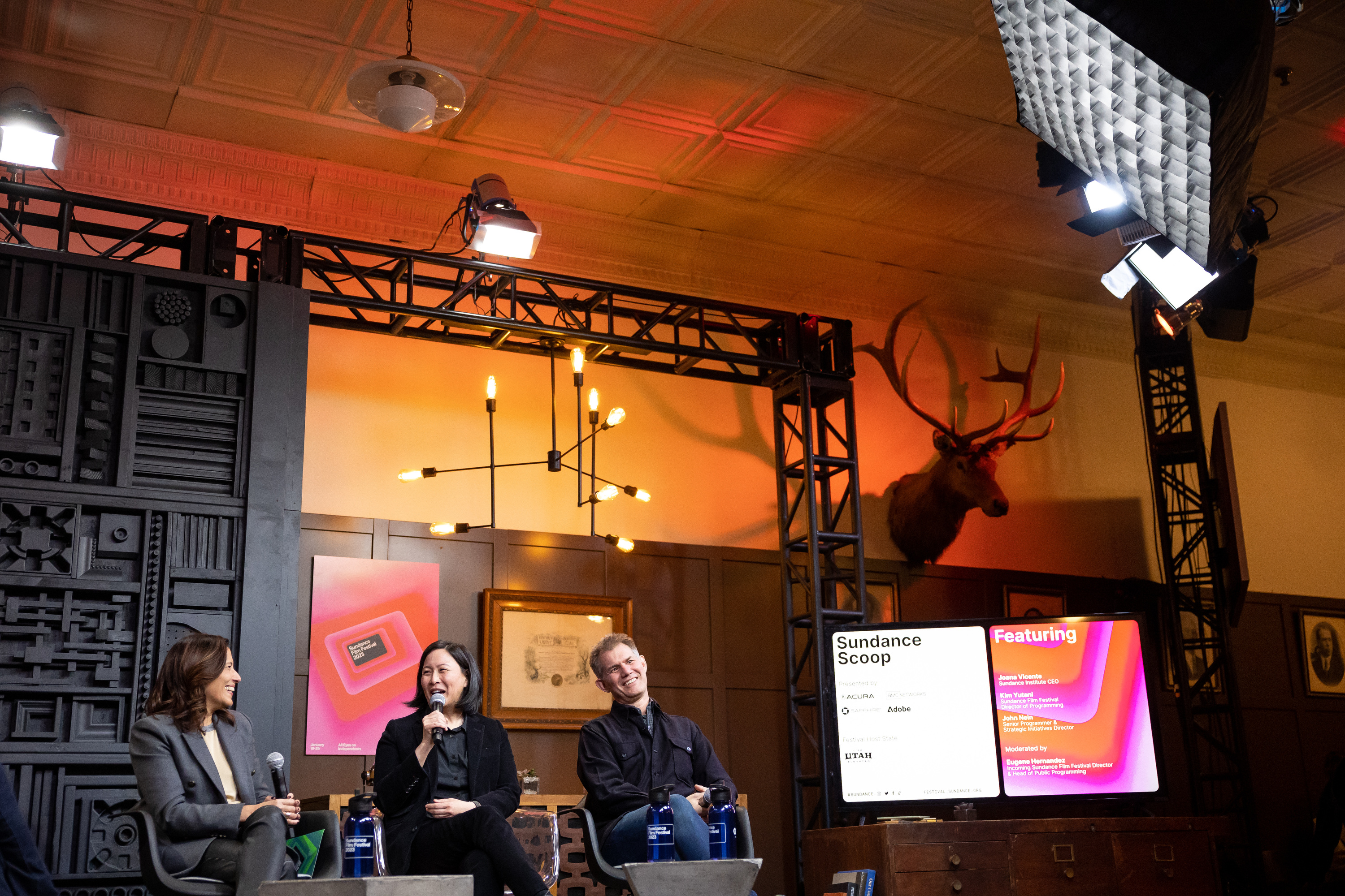 Joana Vicente, CEO of Sundance Institute, left, Kim Yutani, director of programming for the festival, and John Nein, senior programmer and strategic initiatives director for the festival, sit together during the Sundance Scoop opening-day press conference at the Filmmaker Lodge in Park City on Thursday. After two years of holding the Sundance Film Festival in a virtual capacity, the renowned festival on Thursday returned to Park City in all of its former glory.