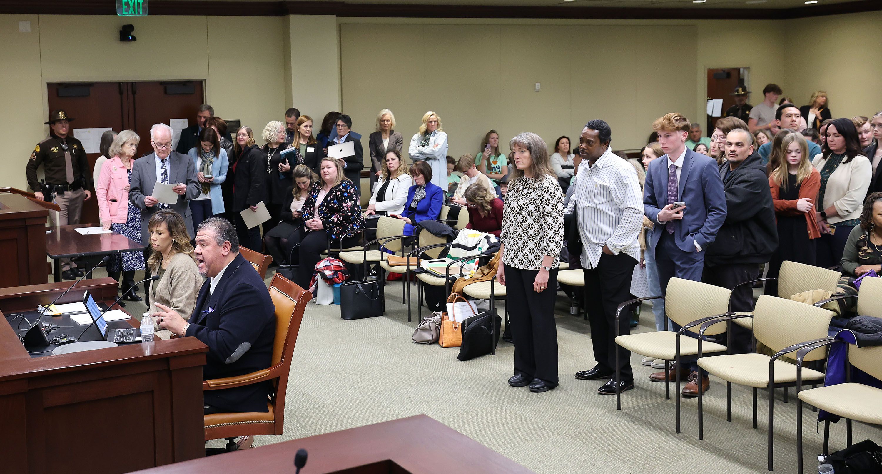 Members of the public line up for comment during a House Education Committee hearing on HB215 at the Capitol in Salt Lake City on Thursday, Jan. 19, 2023. The bill would create the Utah Fits All Scholarships, which would link a teacher salary increase to a “school choice” program.