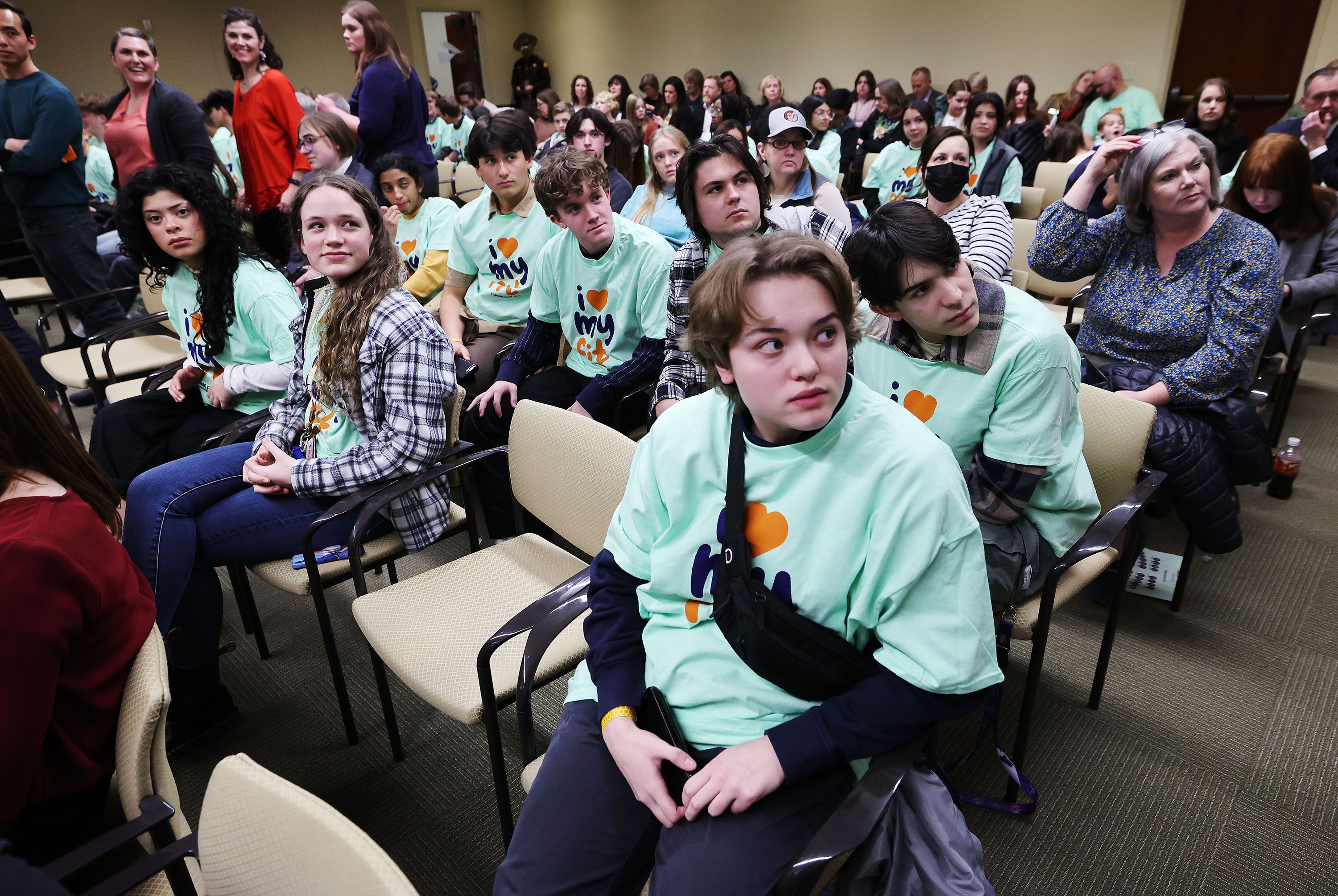 Juan Diego students wear “I love my Fit” shirts during a House Education Committee hearing about HB215 at the Capitol in Salt Lake City on Thursday, Jan. 19, 2023. The bill would create the Utah Fits All Scholarships, which would link a teacher salary increase to a “school choice” program.