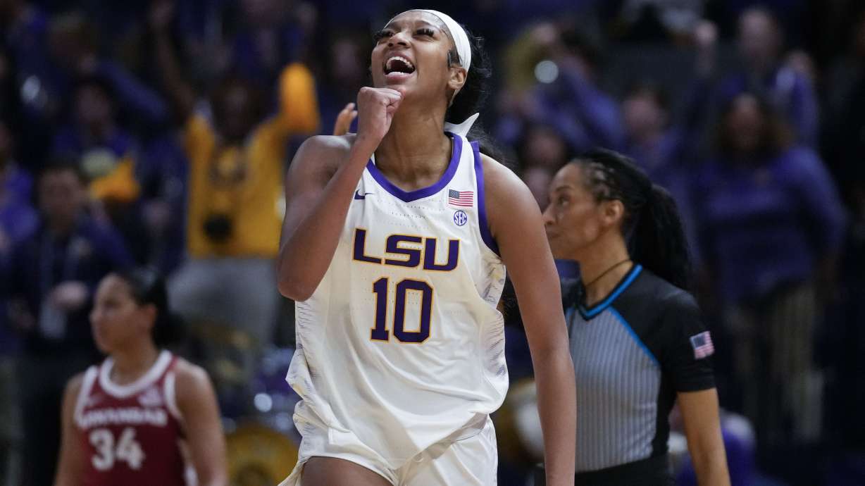 LSU forward Angel Reese (10) celebrates after a turnover in the second half an NCAA college basketball game against Arkansas in Baton Rouge, La., Thursday, Jan. 19, 2023. LSU won 79-76.