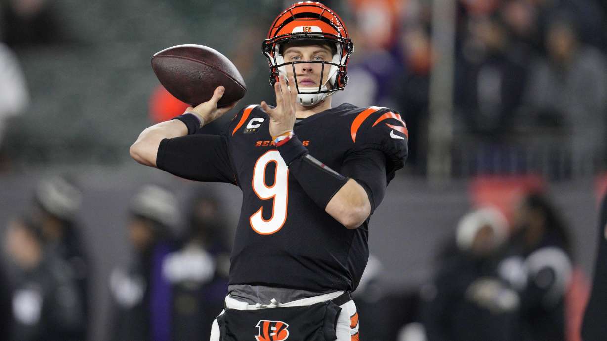 Cincinnati Bengals quarterback Joe Burrow (9) warms up before an NFL wild-card playoff football game against the Baltimore Ravens in Cincinnati, Sunday, Jan. 15, 2023.