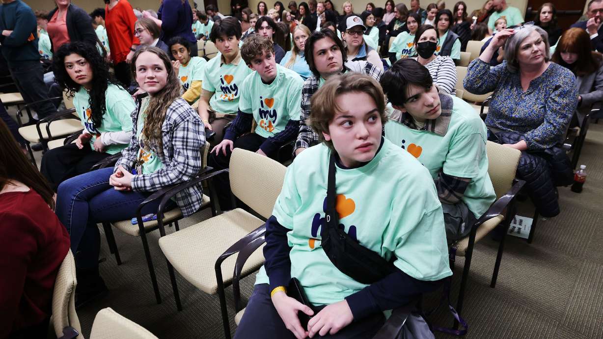 Juan Diego students wear “I love my Fit” shirts during a hearing about HB215 at the Capitol in Salt Lake City Thursday. The bill would create the Utah Fits All Scholarships, which would link a teacher salary increase to a “school choice” program.