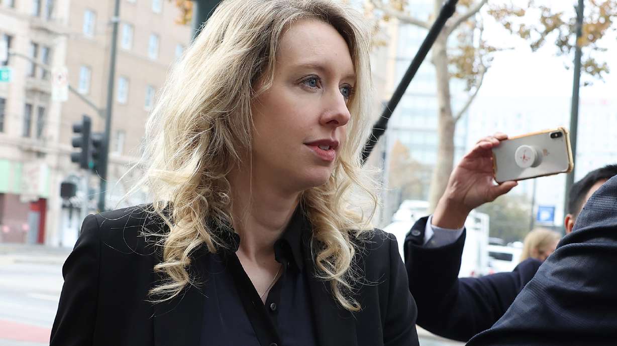 Elizabeth Holmes, pictured here in California in November of 2022, made an "attempt to flee the country" by booking a one-way ticket to Mexico departing in January 2022, shortly after the Theranos founder was convicted of fraud, prosecutors alleged in a new court filing on Friday.