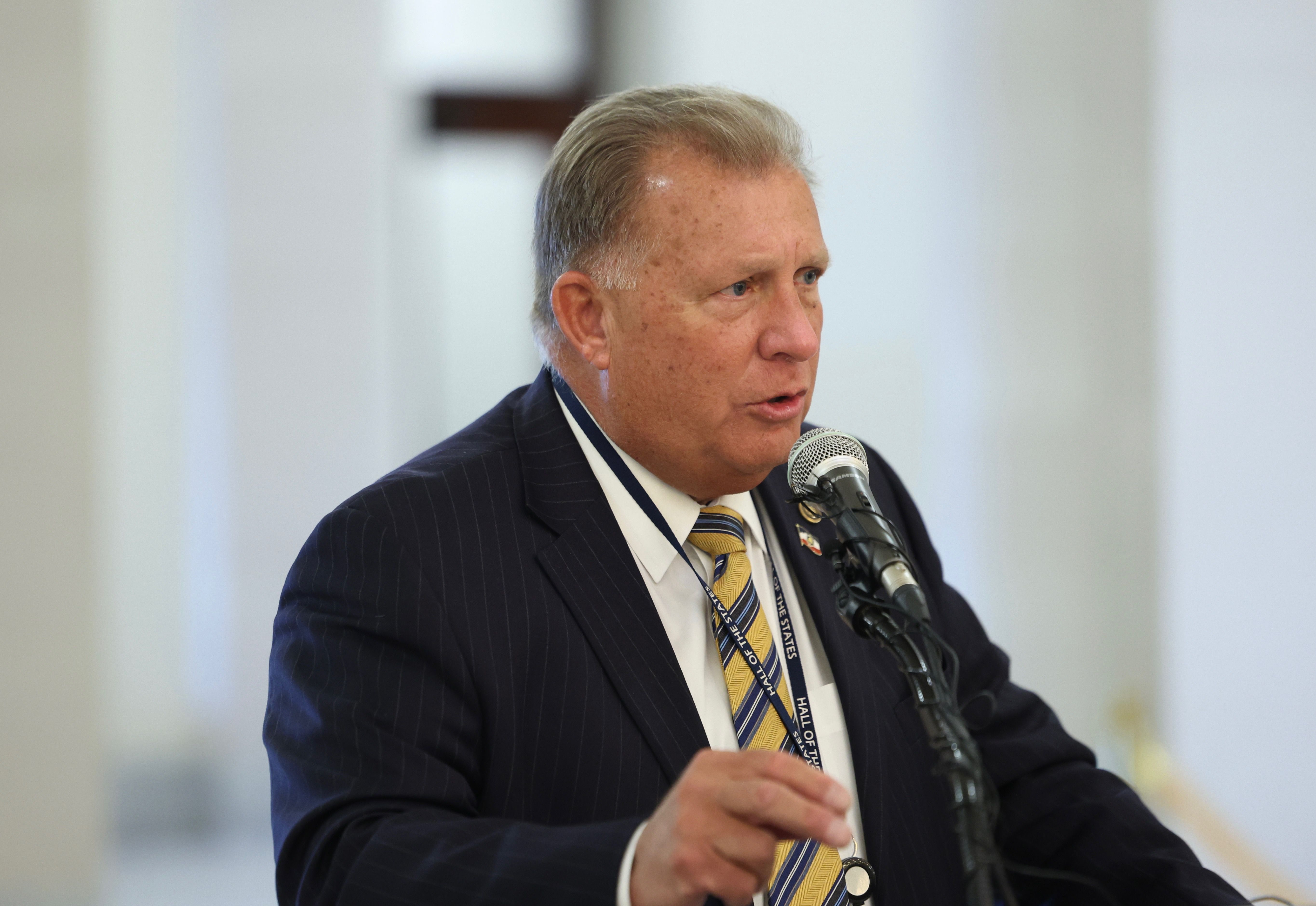 Sen. Curtis Bramble, R-Provo, speaks Friday at the state Capitol about a close friend who didn’t have access to medicine for a chronic illness.