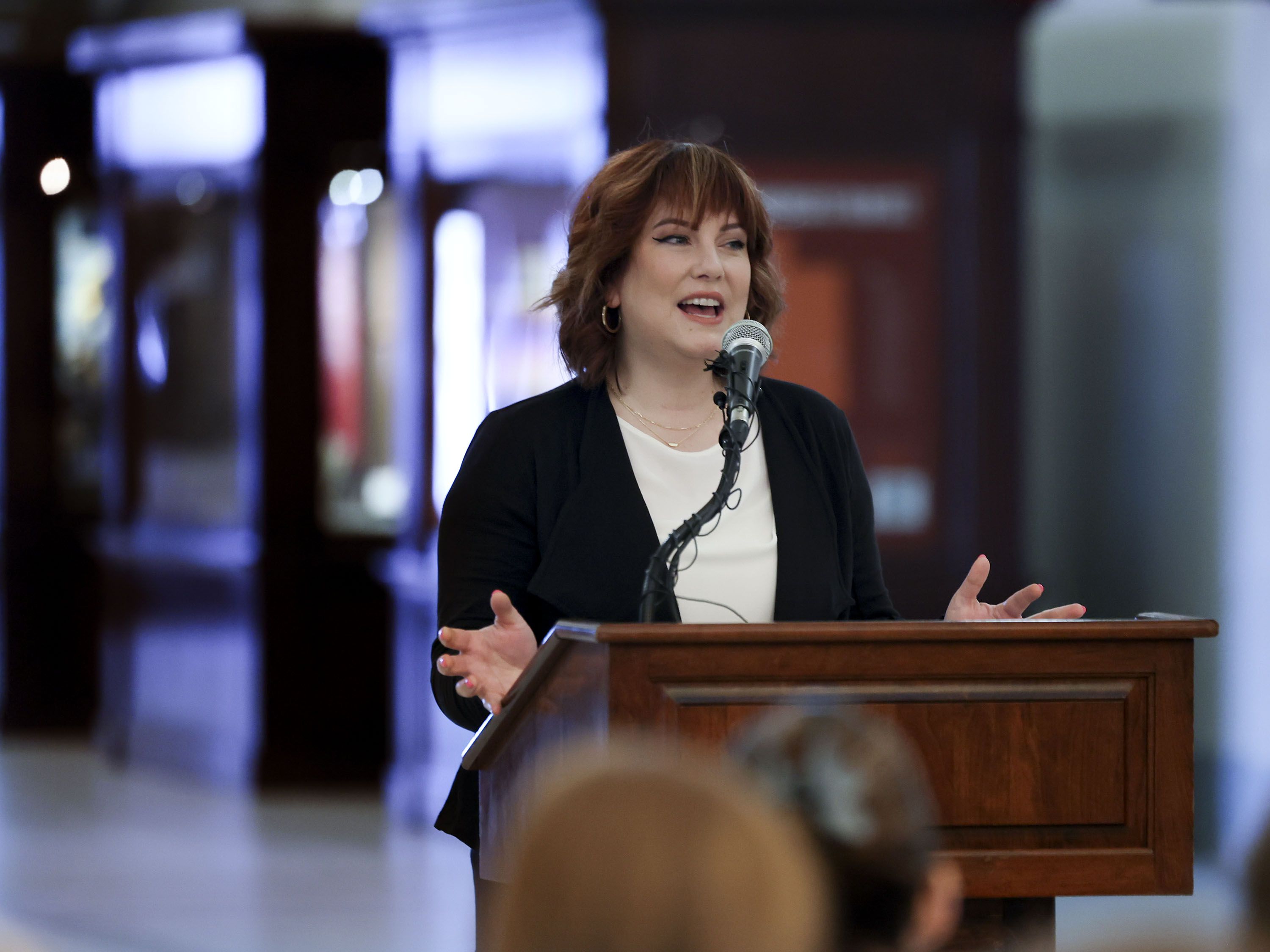 Jen Hepworth, whose daughter, Penny, 9, has cystic fibrosis, speaks about potential upcoming legislation on reducing the cost for prescription drugs for chronic illnesses at the Capitol in Salt Lake City on Friday.