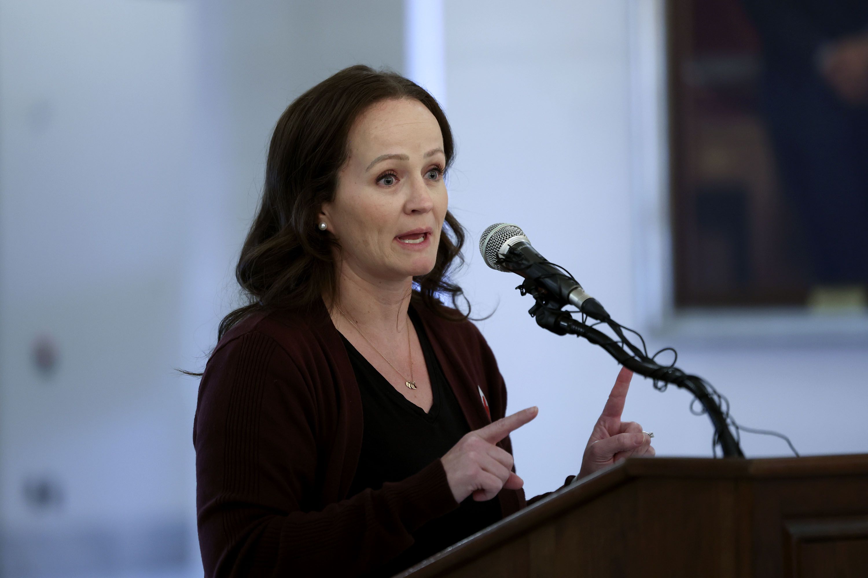 Ashley Bowen, a parent, speaks about potential upcoming legislation on reducing the cost of prescription drugs for chronic illnesses at the Capitol in Salt Lake City on Friday.