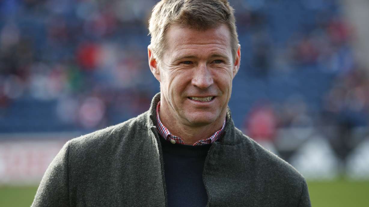 FILE - Brian McBride waits for an MLS soccer match between the Chicago Fire and Portland Timbers, March 31, 2018, in Bridgeview, Ill. McBride is out as general manager of the U.S. men's national team, U.S. Soccer Federation sporting director Earnie Stewart told the governing body's board of directors.
