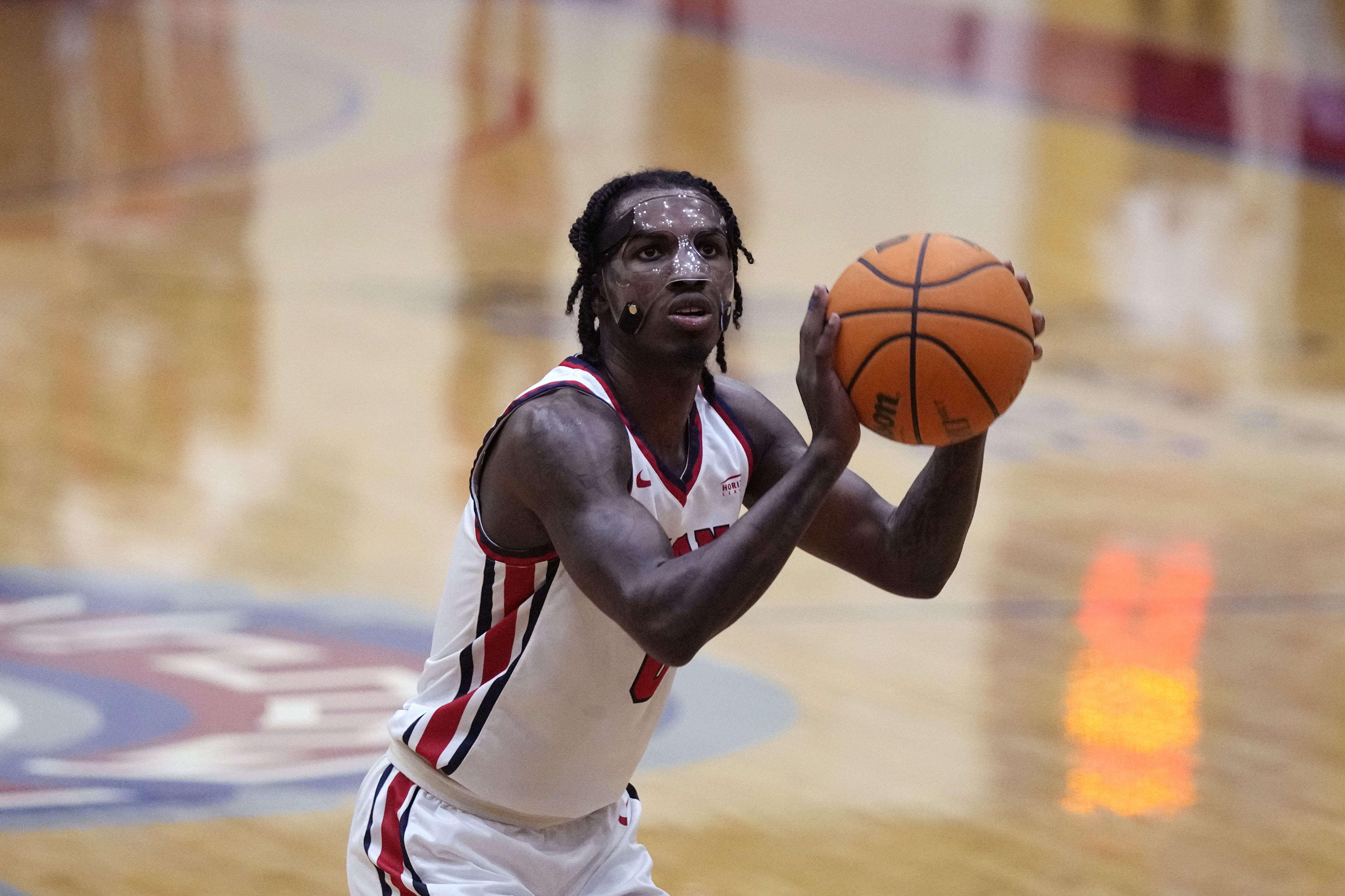 Detroit Mercy guard Antoine Davis shoots a free-throw during an NCAA college basketball game against Youngstown State, Thursday, Jan. 12, 2023, in Detroit. Davis, the nation's leading scorer, made a personal-best 11 3-pointers in a win over Robert Morris on Jan. 14, giving him 513 in a career few saw coming when he stepped on campus.