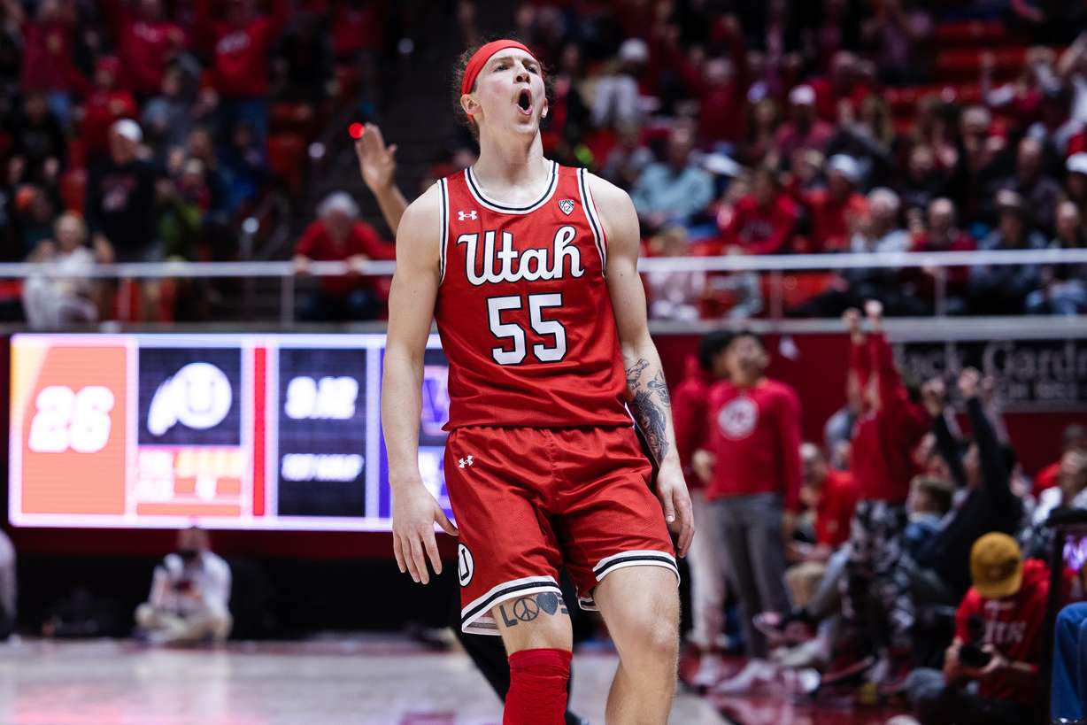 Utah guard Gabe Madsen celebrates after scoring during a NCAA college basketball game at the Huntsman Center in Salt Lake City on Saturday, Jan. 21, 2023.