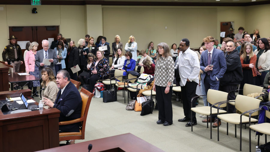 Members of the public line up for comment during a House Education Committee hearing on HB215 at the Capitol in Salt Lake City on Jan. 19. The bill would create the Utah Fits All Scholarships, which would link a teacher salary increase to a “school choice” program.