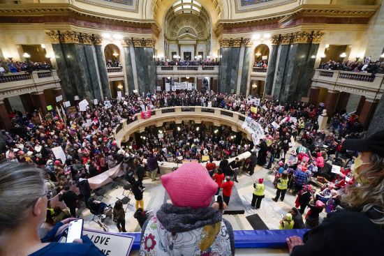 Protesters are seen in the Wisconsin Capitol Rotunda during a march supporting overturning Wisconsin's near total ban on abortion Sunday in Madison, Wisconsin.