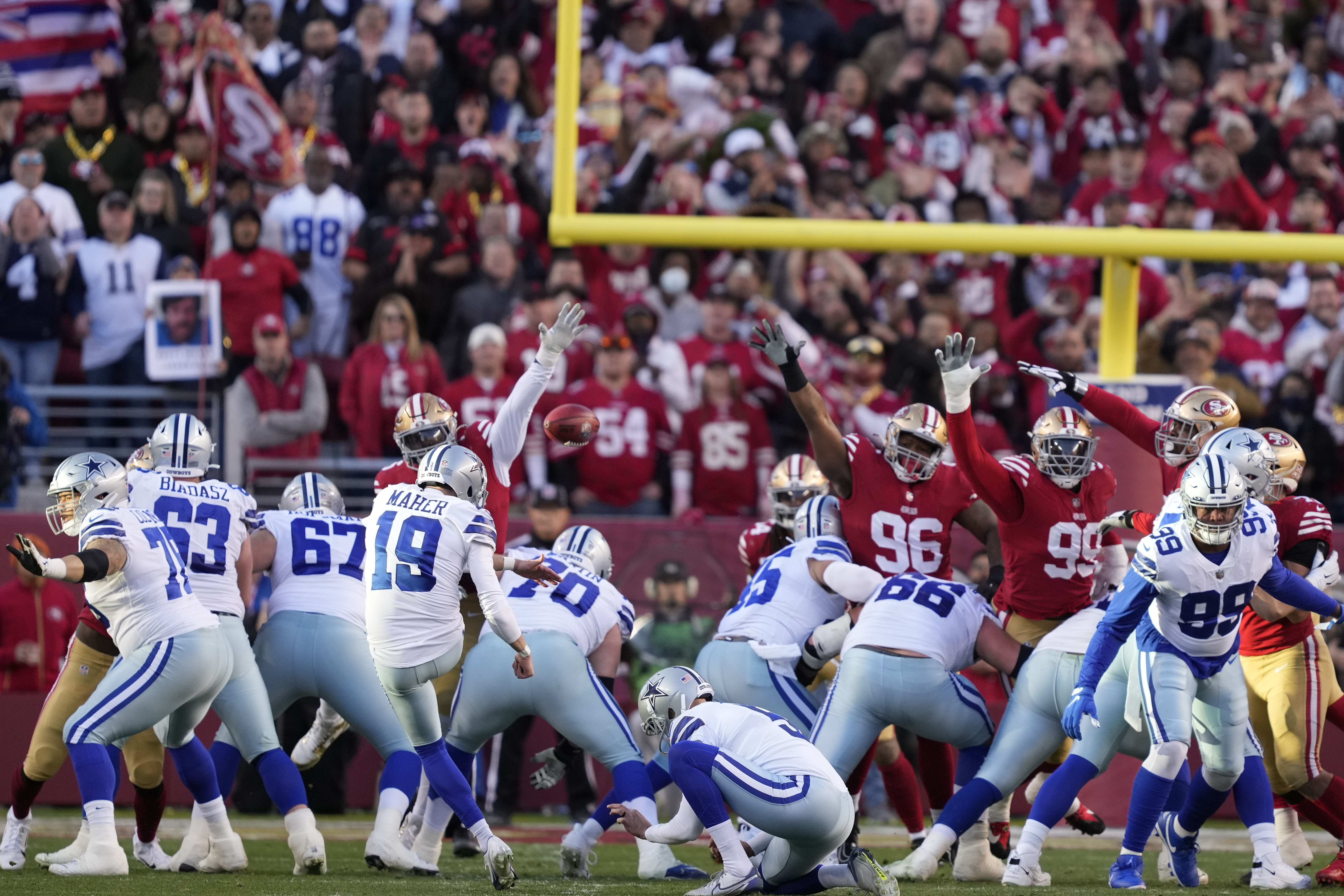 Dallas Cowboys place kicker Brett Maher (19) has a point after try blocked by San Francisco 49ers' Samson Ebukam during the first half of an NFL divisional round playoff football game in Santa Clara, Calif., Sunday, Jan. 22, 2023. 