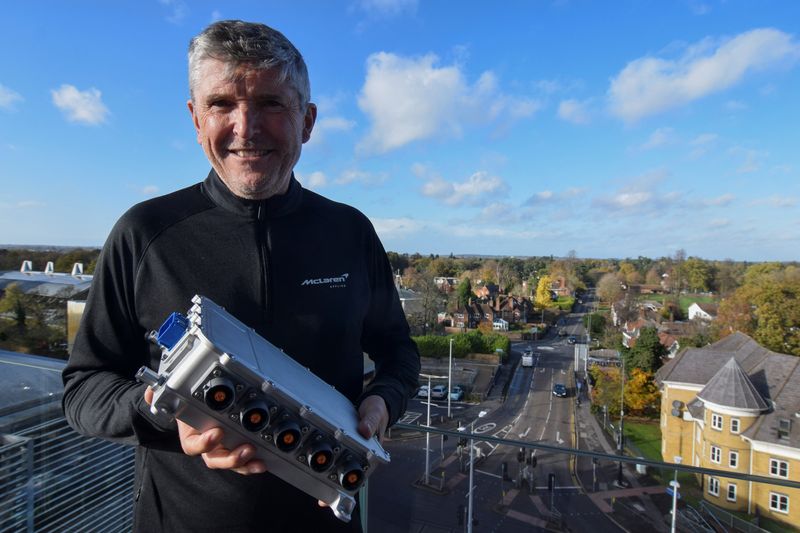 Nick Fry, chief executive of McLaren Applied, holds the IPG5 inverter the Formula One engineering and technology firm has developed for luxury carmakers and which will start appearing in premium electric vehicles in January 2025 in Woking, Britain, Nov. 23, 2022.
