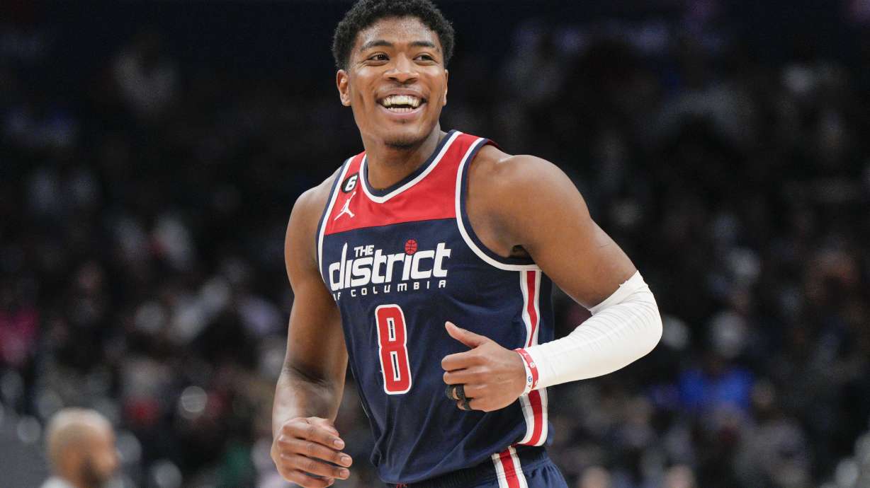 Washington Wizards forward Rui Hachimura (8) smiles after scoring against the Orlando Magic during the second half of an NBA basketball game, Saturday, Jan. 21, 2023, in Washington.
