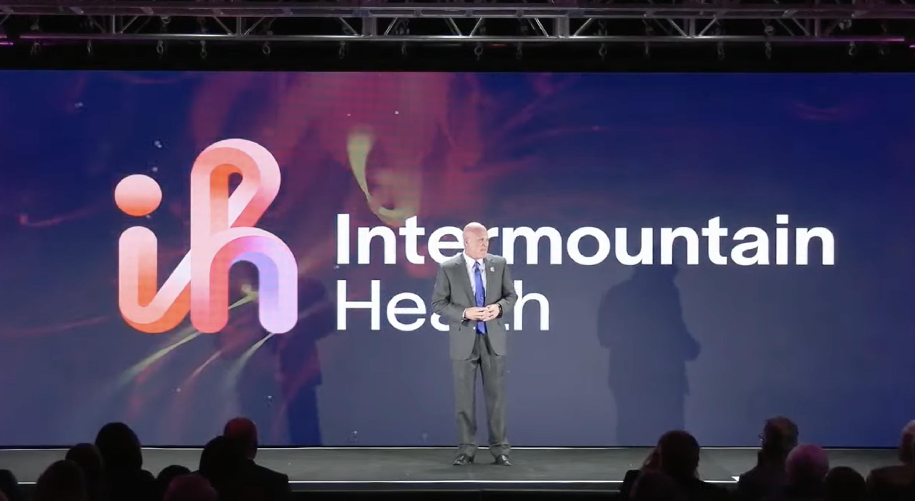 Rob Allen speaks to Intermountain Health investors and employees at a rebranding event on Monday.