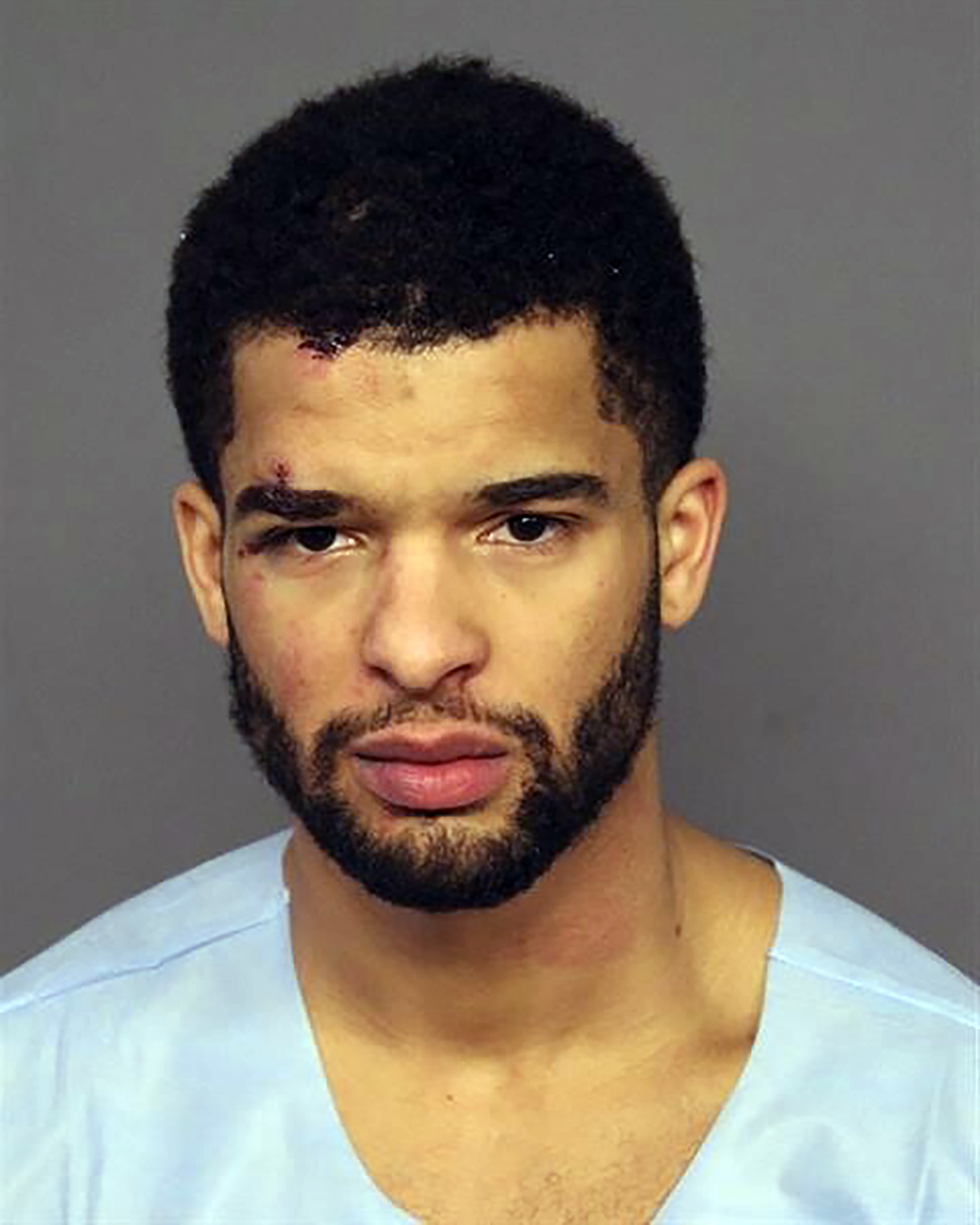 This undated booking photo provided by the Denver Police Department shows Coban Porter. Police say Porter, a University of Denver basketball player, smelled of alcohol and was slurring his speech when he was arrested following a fatal crash in Denver on Sunday, Jan. 22, 2023. 