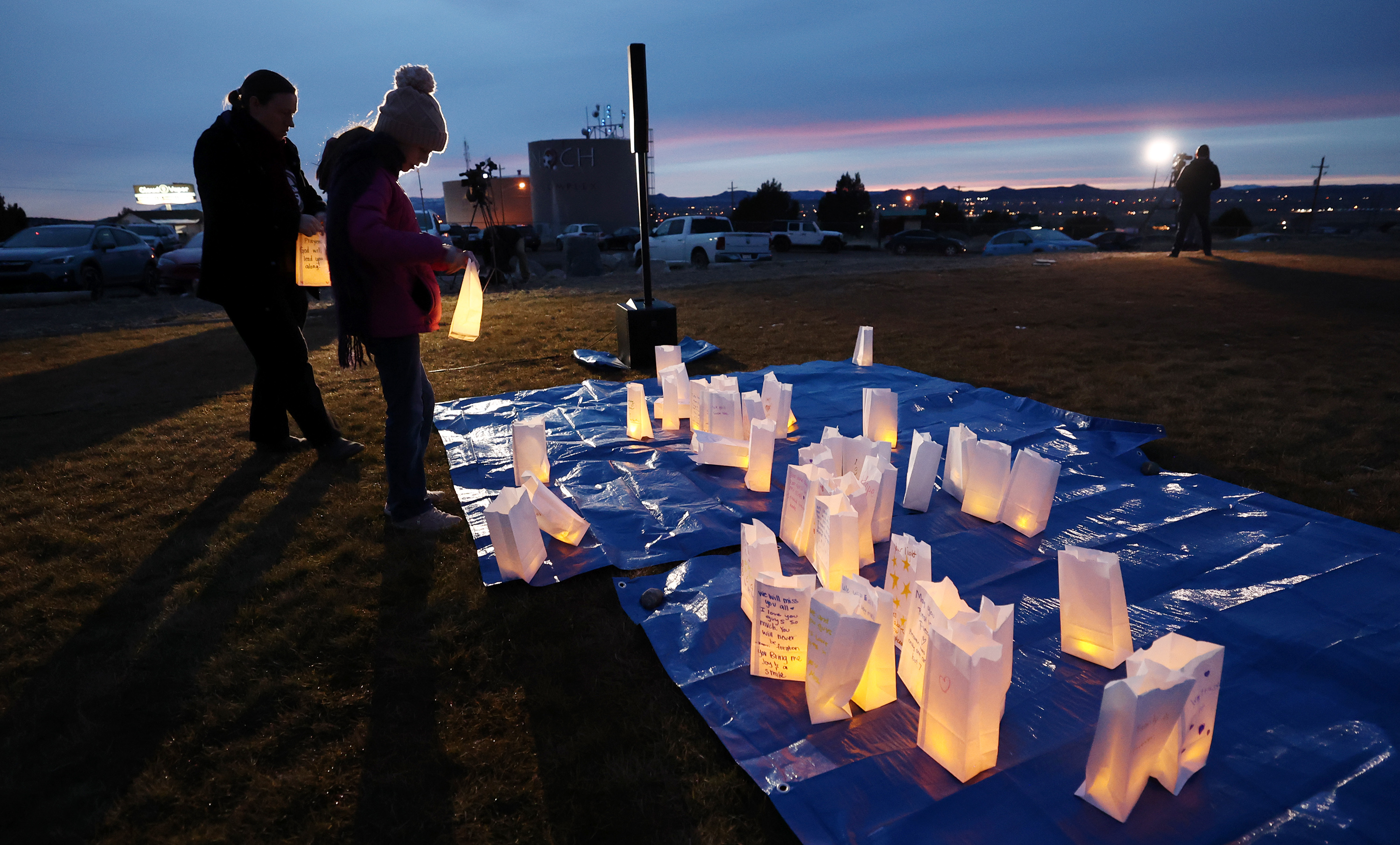 Residents of the town of Enoch come together in honor of Gail Earl and the Haight Family at a vigil on Jan. 13. The father who shot and killed his family made some chilling Google searches before the murders suggesting premeditation.