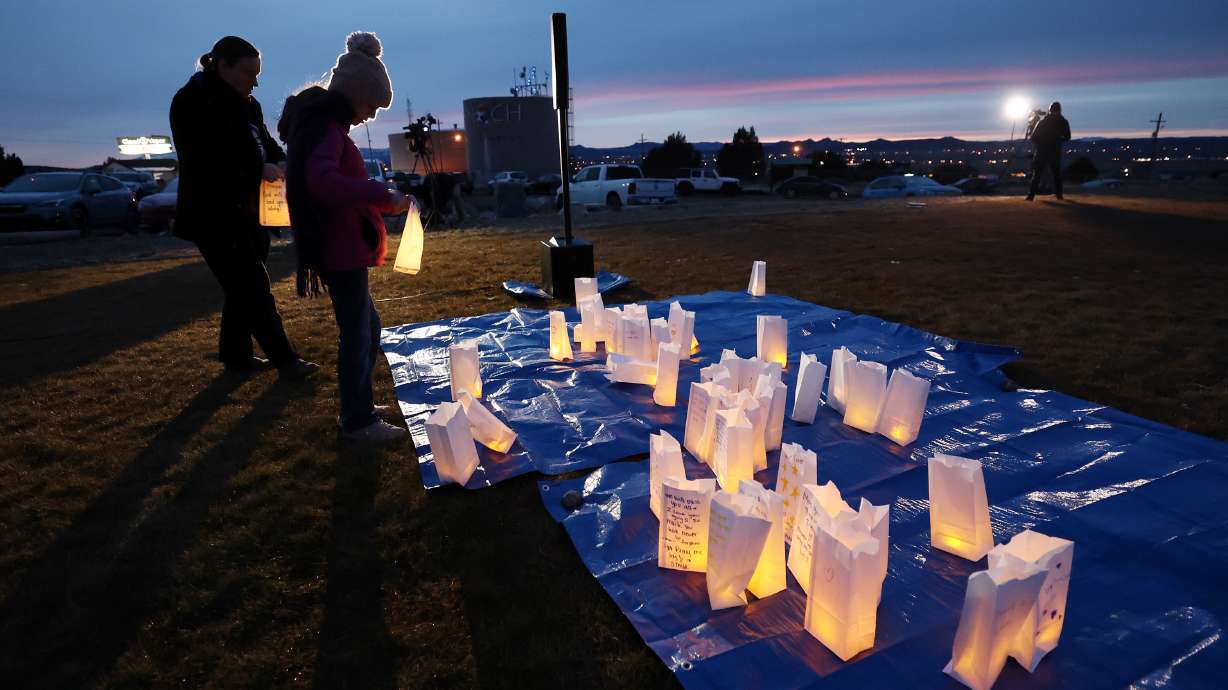 Residents of the town of Enoch, Iron County, come together in honor of Gail Earl and the Haight family at a vigil at the sports complex in Enoch on Jan. 13.