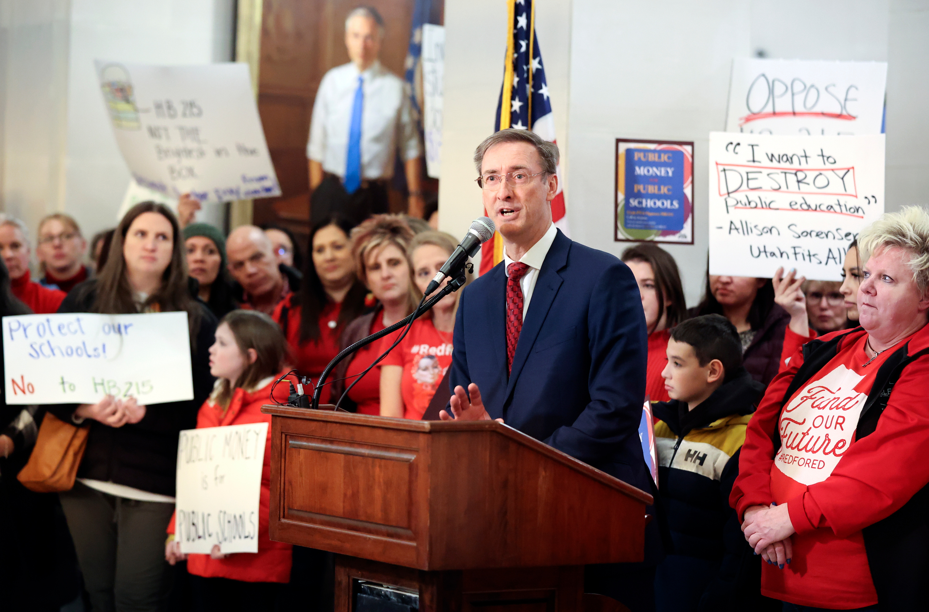 Todd Hauber, Utah Association of School Business Officials president, speaks at a rally against school vouchers at the Capitol in Salt Lake City, on Monday.