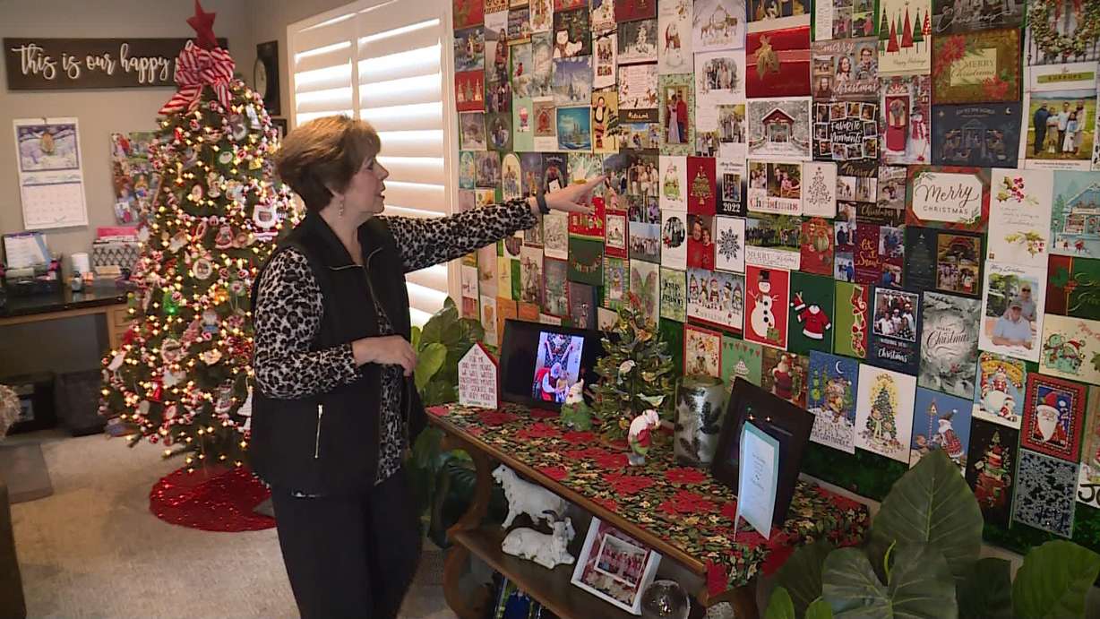 Kerri Robbins looks at Christmas cards in her home in Lehi. Thousands of Utahns responded to her plea to test homes for radon in November after she was diagnosed with stage-four non-smoking lung cancer.