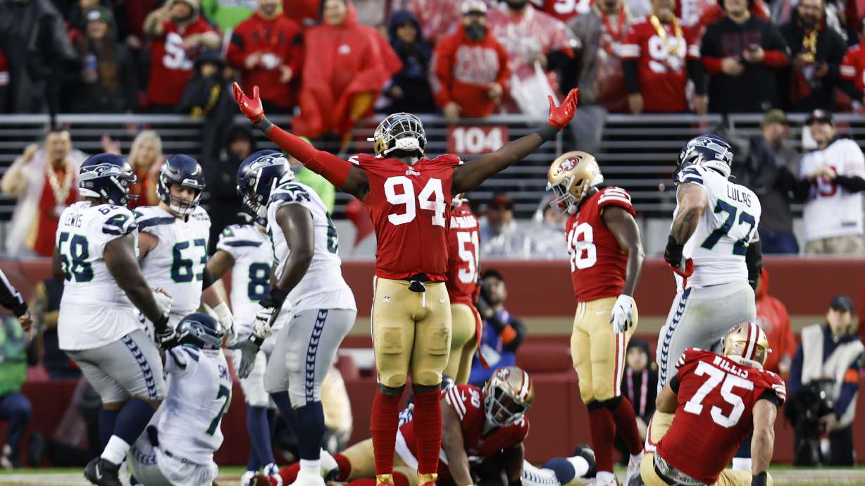 San Francisco 49ers defensive end Charles Omenihu (94) celebrates during the second half of an NFL wild card playoff football game against the Seattle Seahawks in Santa Clara, Calif., Saturday, Jan. 14, 2023. The 49ers won 41-23.