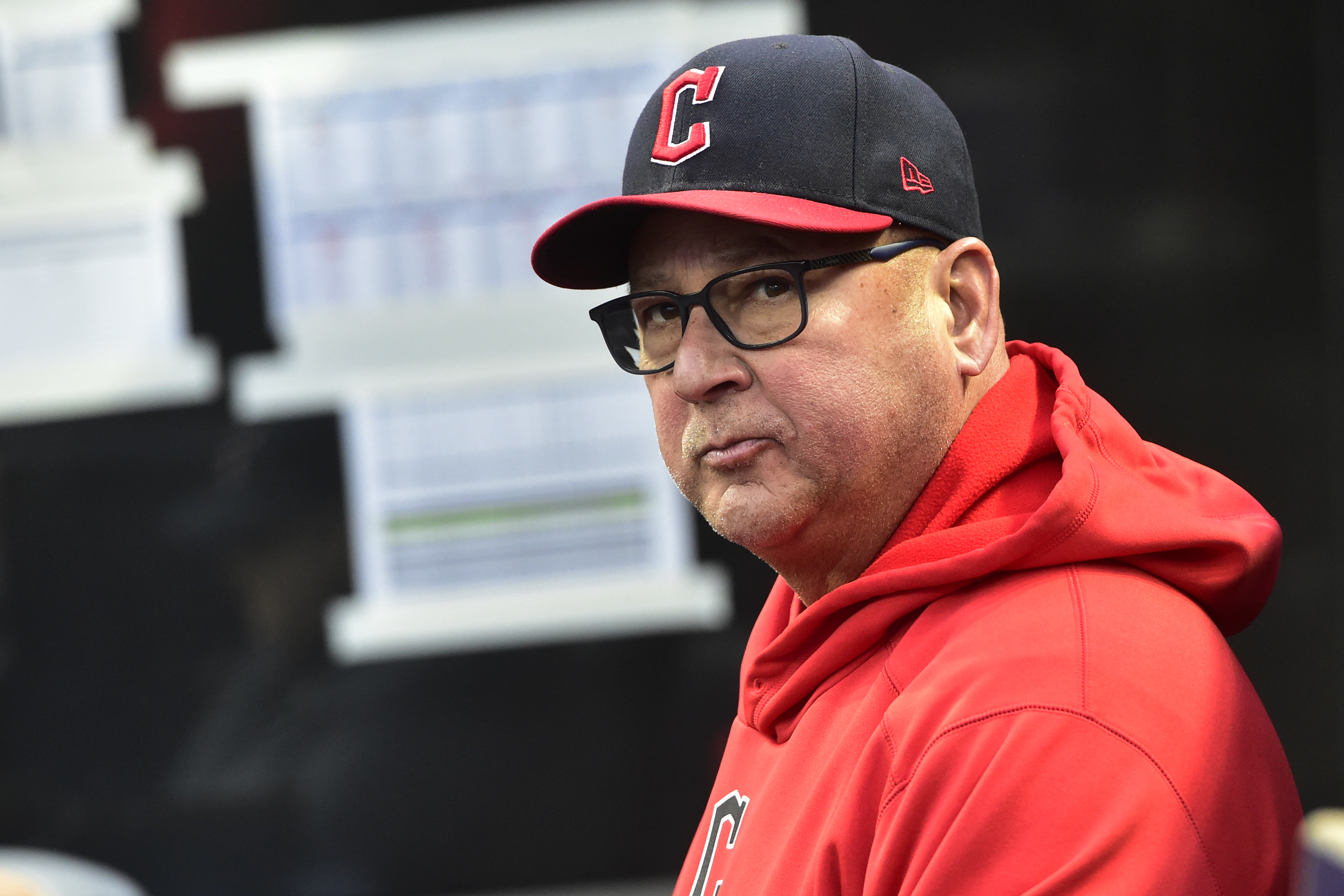 FILE - Cleveland Guardians manager Terry Francona looks on from the dugout before Game 4 of a baseball AL Division Series against the New York Yankees, Sunday, Oct. 16, 2022, in Cleveland. The scooter that Francona rides from his downtown Cleveland apartment to Progressive Field was swiped over the weekend. Francona’s scooter was parked outside his residence. A team spokesman said police were notified of the theft, which happened late Friday night or early Saturday Jan. 21.
