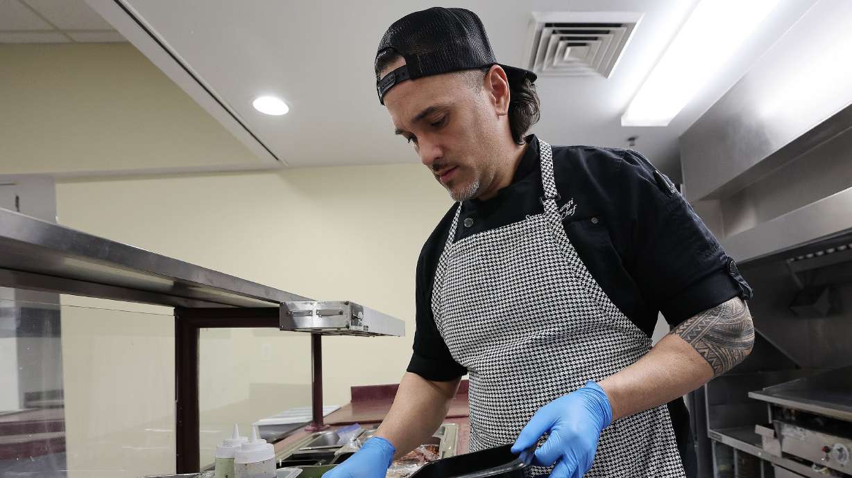 Cafe Limon owner and executive chef Spencer Langi prepares tacos at the restaurant in West Valley City on Jan. 18.