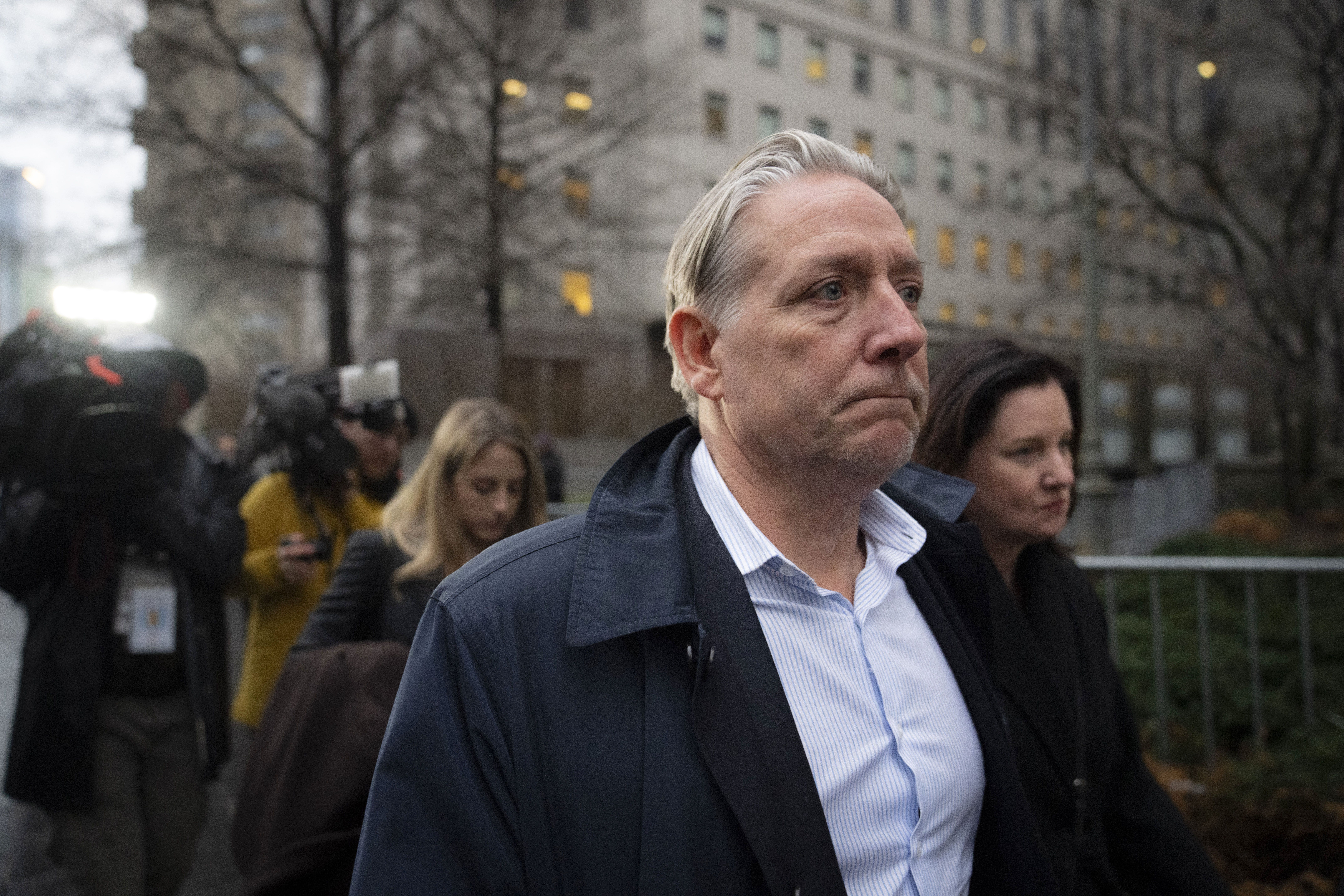 Charles McGonigal, former special agent in charge of the FBI’s counterintelligence division in New York, leaves court, Monday in New York. The former high-ranking FBI counterintelligence official has been indicted on charges he helped a Russian oligarch, in violation of U.S. sanctions.
