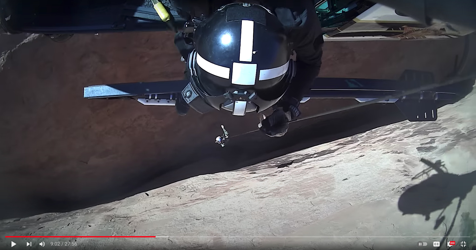 A screenshot taken from the Utah Department of Public Safety’s YouTube page shows rescuers being lowered down from the DPS helicopter into a slot canyon in Garfield County to hoist out 15 teens and two adults in June 2022.