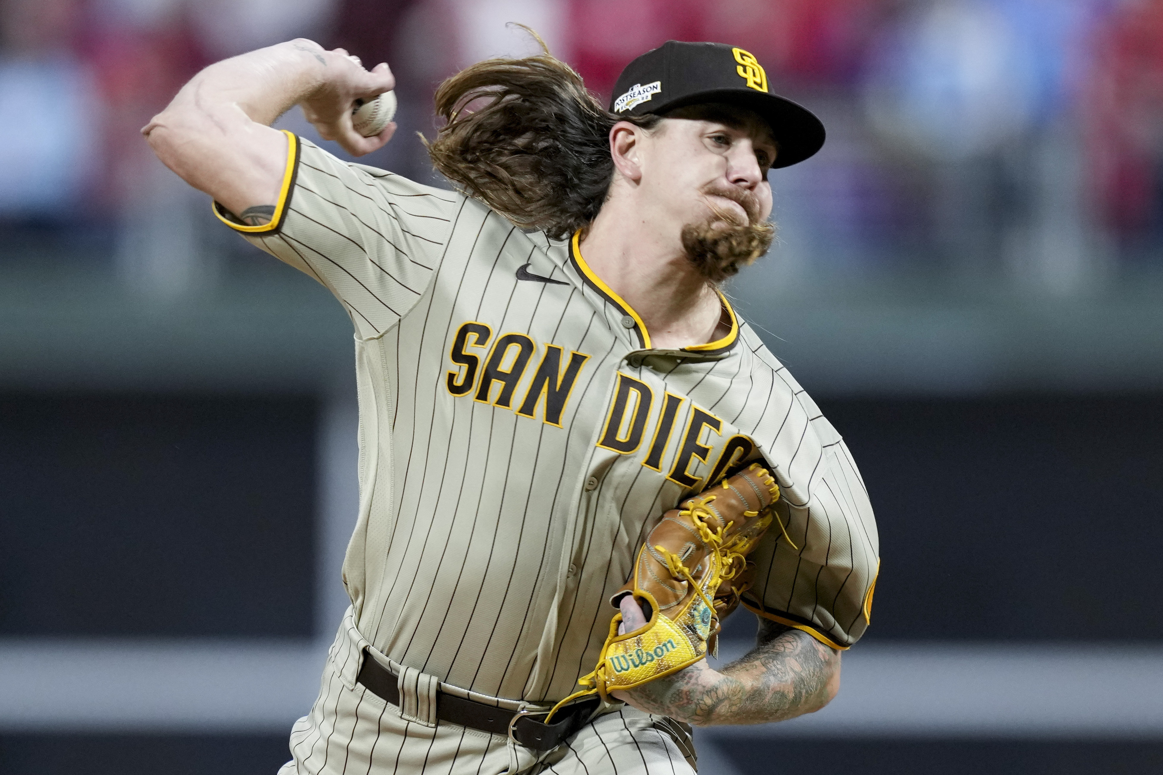 FILE -San Diego Padres starting pitcher Mike Clevinger throws during the first inning in Game 4 of the baseball NL Championship Series between the San Diego Padres and the Philadelphia Phillies on Oct. 22, 2022, in Philadelphia. Chicago White Sox pitcher Mike Clevinger is being investigated by Major League Baseball following an allegation of domestic violence, Tuesday, Jan. 24, 2023.