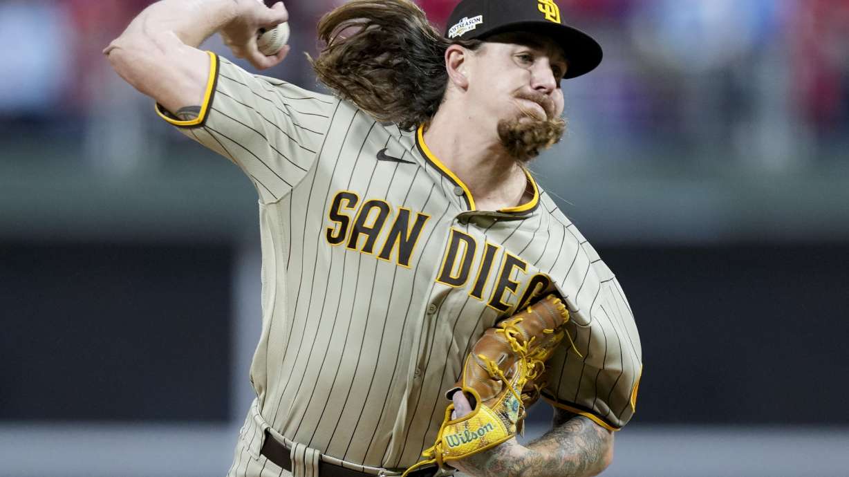 FILE -San Diego Padres starting pitcher Mike Clevinger throws during the first inning in Game 4 of the baseball NL Championship Series between the San Diego Padres and the Philadelphia Phillies on Oct. 22, 2022, in Philadelphia. Chicago White Sox pitcher Mike Clevinger is being investigated by Major League Baseball following an allegation of domestic violence, Tuesday, Jan. 24, 2023.