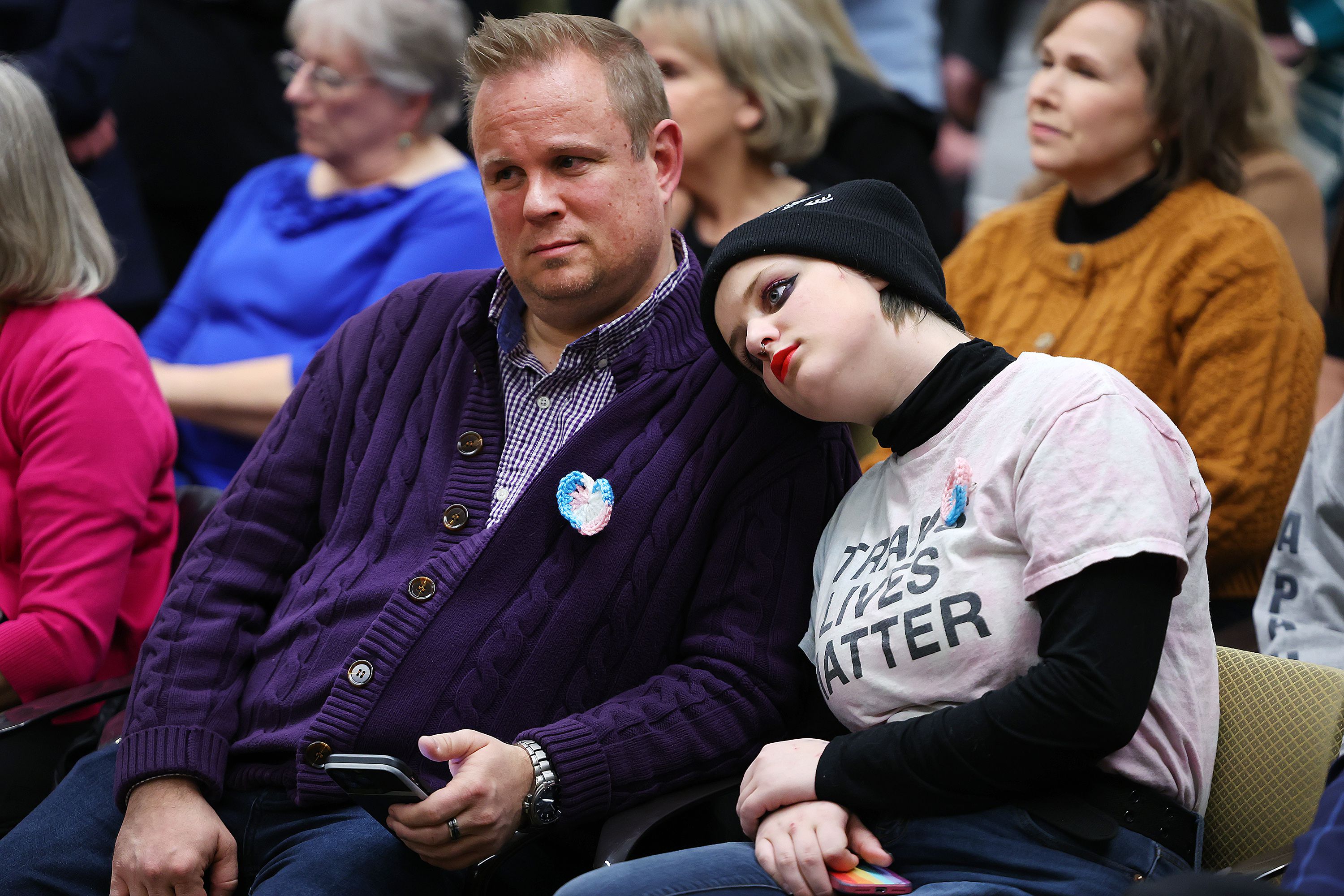 Jeff Case and Moth Case attend the House Health and Human Services Standing Committee as they hear HB132 and SB16, both transgender rights bills, at the Capitol in Salt Lake City on Tuesday.