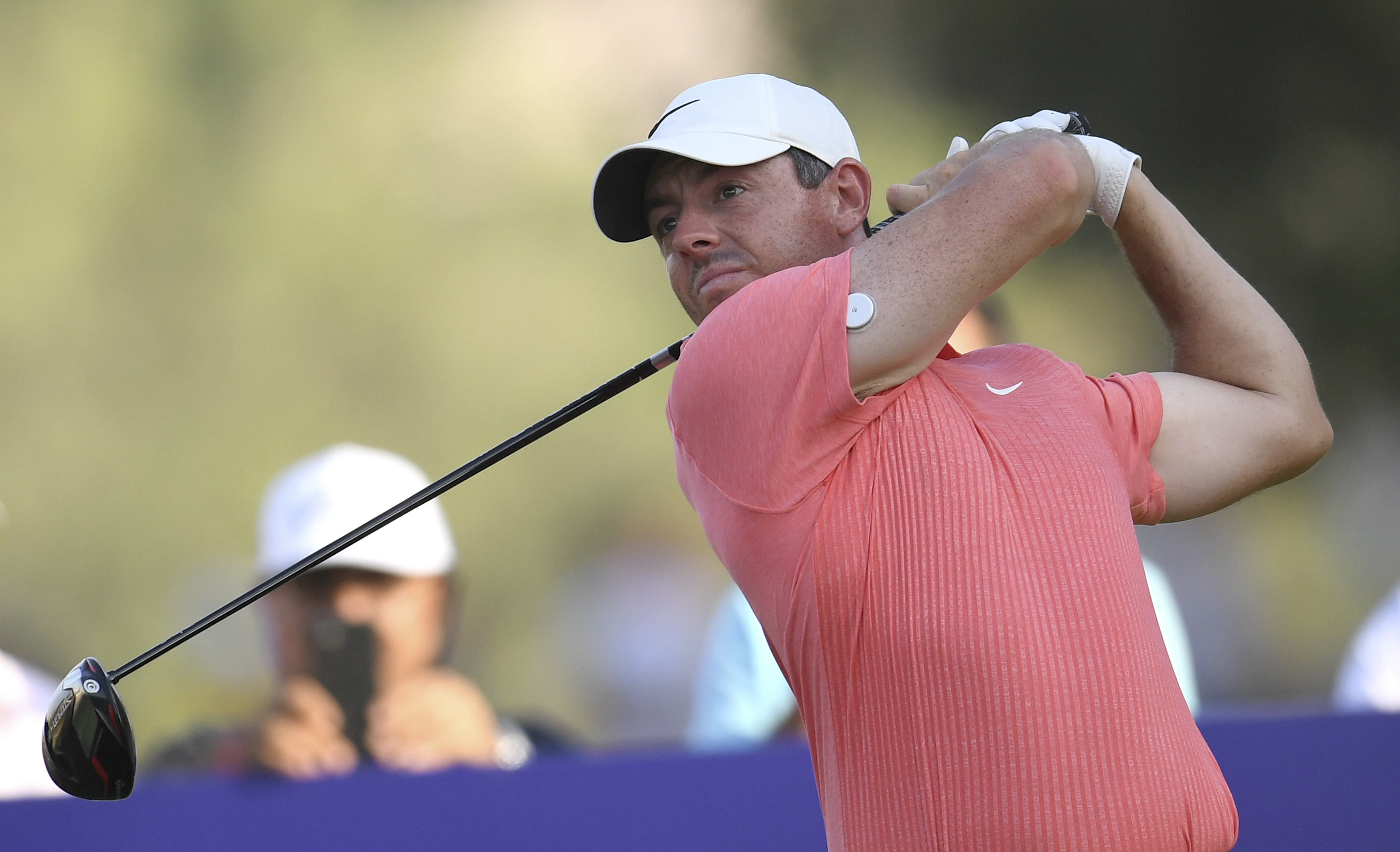 FILE - Rory McIlroy of Northern Ireland tees off at the 18th hole during DP World Tour Championship in Dubai, United Arab Emirates, on Nov. 19, 2022. McIlroy was one of the most vocal critics of the LIV Golf breakaway league last year. It left him feeling mentally drained so he decided to put his clubs away for a few weeks around Christmas. Now he’s back and appears to be as fiery as ever as he prepares to play the Dubai Desert Classic.