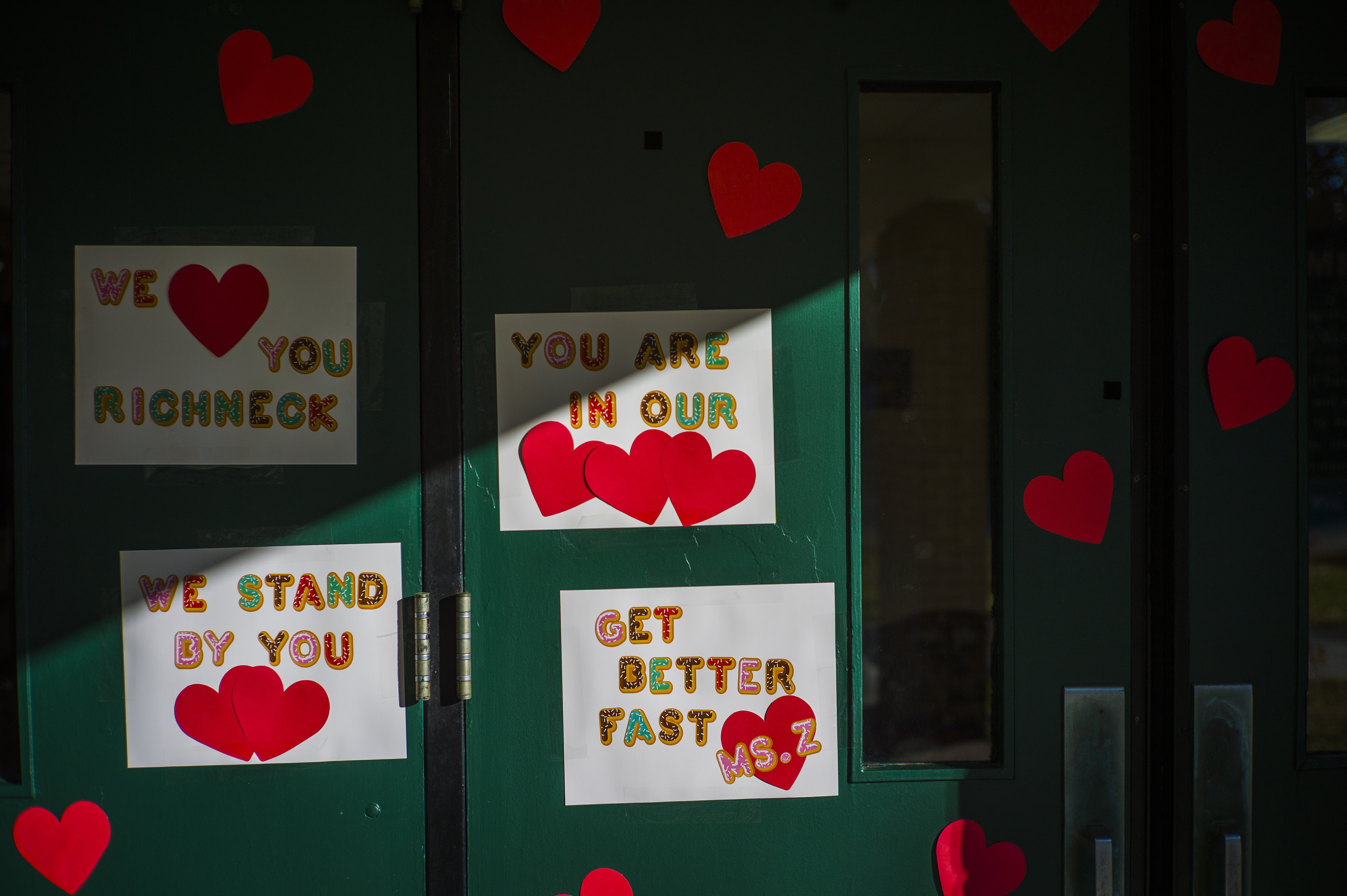 Messages of support for teacher Abby Zwerner, who was shot by a 6-year-old student, grace the front door of Richneck Elementary School Newport News, Va., on Jan. 9. According to a Tuesday media advisory, the first-grade teacher has hired a trial attorney to represent her.