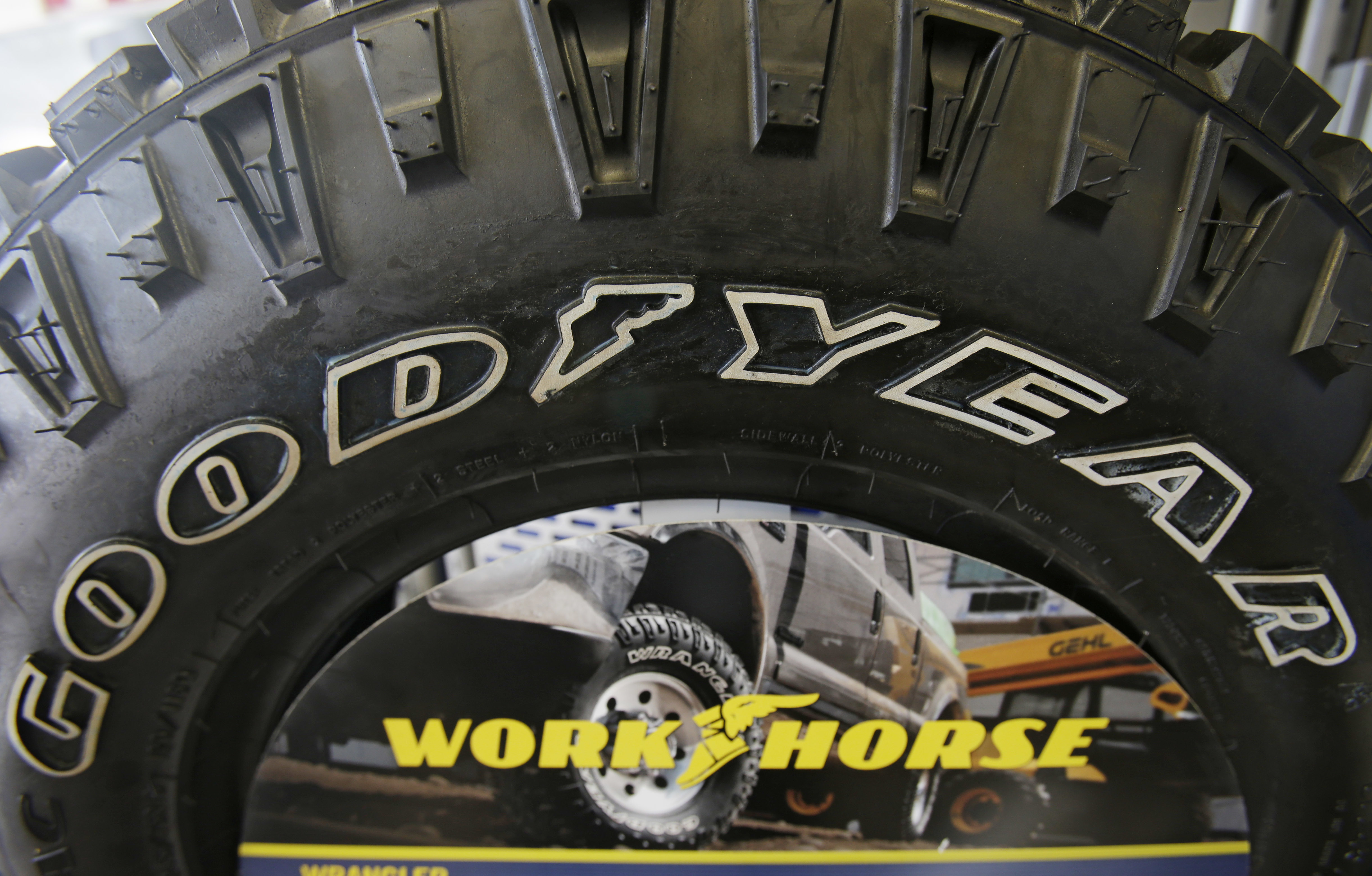 A Goodyear tire sits at a tire shop on Feb. 12, 2014, in South Euclid, Ohio. A federal grand jury in Los Angeles is gathering evidence in a criminal investigation of Goodyear recreational vehicle tires that the government blames for crashes that killed eight people and injured dozens of others.