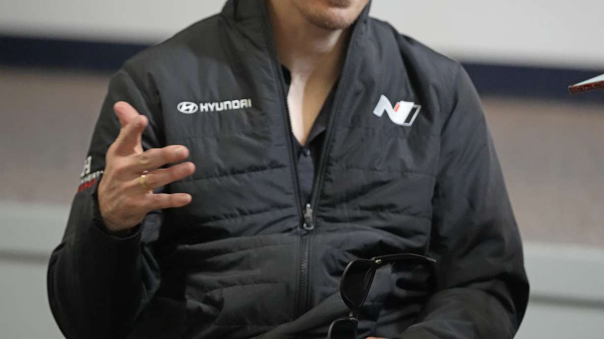 Robert Wickens answers questions during an interview prior to the Rolex 24 hour auto race at Daytona International Speedway, Thursday, Jan. 26, 2023, in Daytona Beach, Fla. Bryan Herta wants to enter Wickens in the Indianapolis 500 as early as 2024. That's even a year longer than preferred because of the work required on the hand control system needed for the paralyzed driver.
