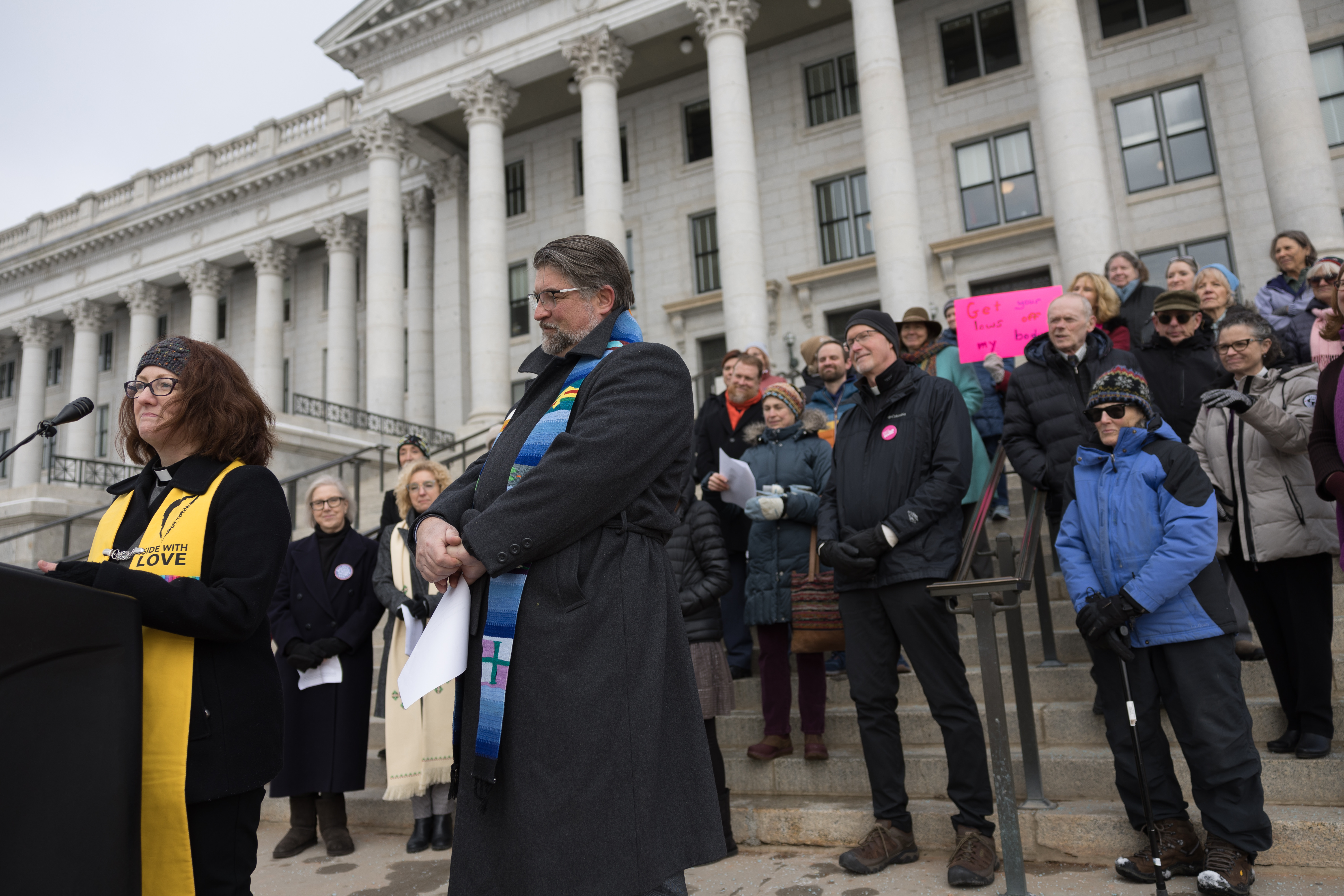 Rev. Monica Dobbins, of First Unitarian Church of Salt Lake City, and Rev. Dr. Curtis Price, of First Baptist Church of Salt Lake City, stand with other faith leaders who are filing an amicus brief in support of Planned Parenthood in its lawsuit challenging Utah’s abortion ban.