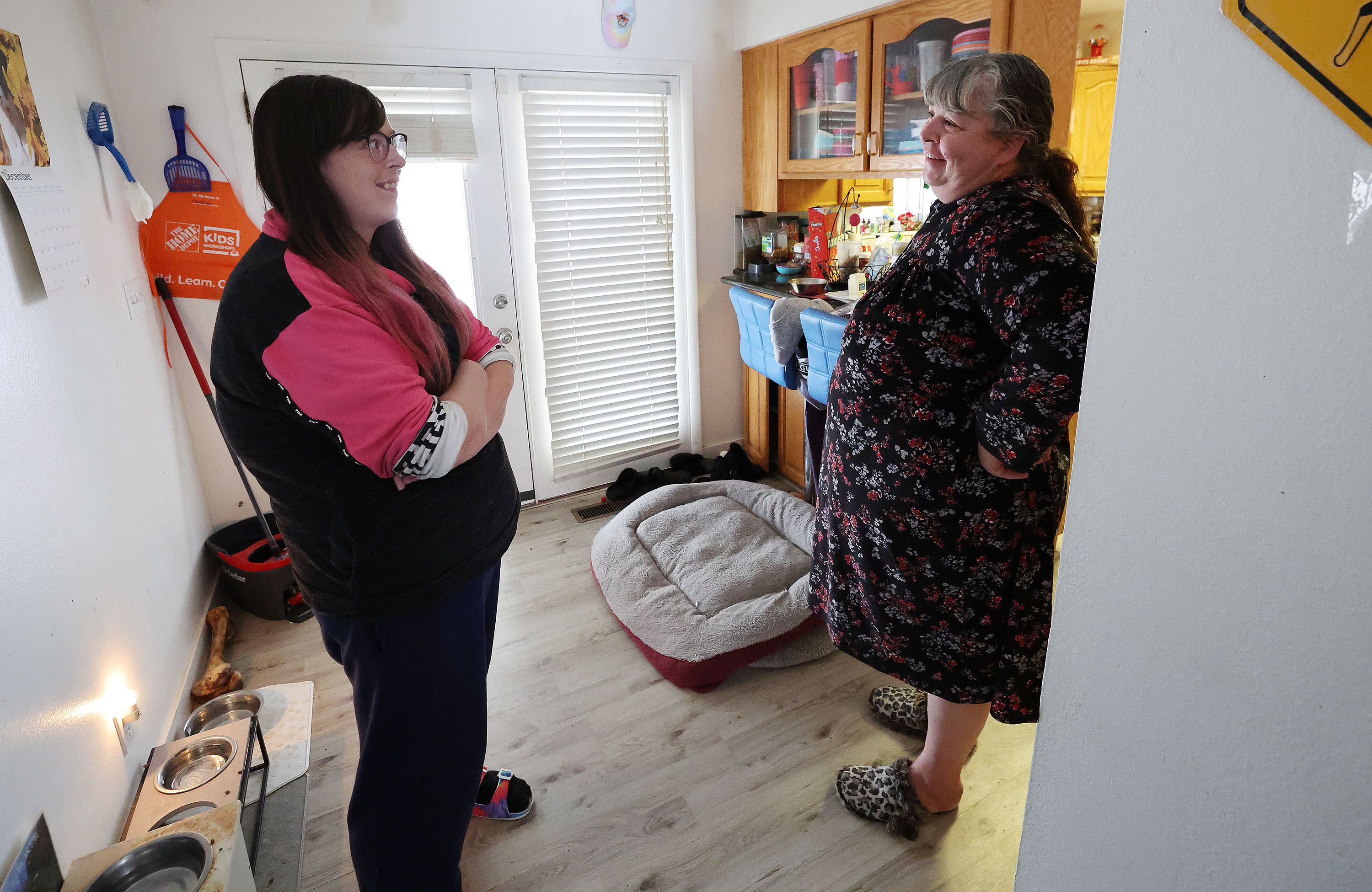 Darlene Wayment talks with her mother Kathy Wayment at her home in Ogden on Jan. 24. Both live in the home.