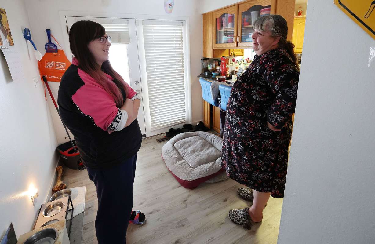 Darlene Wayment talks with her mother Kathy Wayment at her home in Ogden on Jan. 24. Both live in the home.