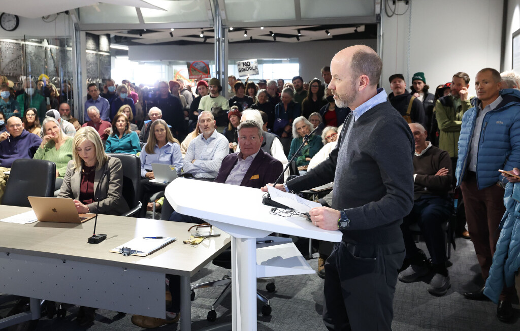 Dave Fields, President and General Manager of Snowbird, speaks in support of a proposed gondola during Wasatch Front Regional Council meeting in Salt Lake City on Thursday. Many protested the plans to add unfinalized recommendations from Utah Department of Transportation to build a gondola in Little Cottonwood Canyon.