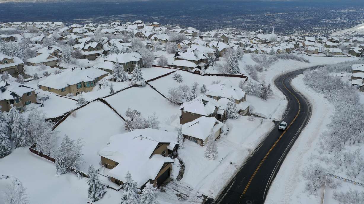 Snow is piled high in Suncrest in Draper on Jan. 18. Snow returns to the Wasatch Front Tuesday, with the potential to deliver 8 to 16 inches over the next few days.