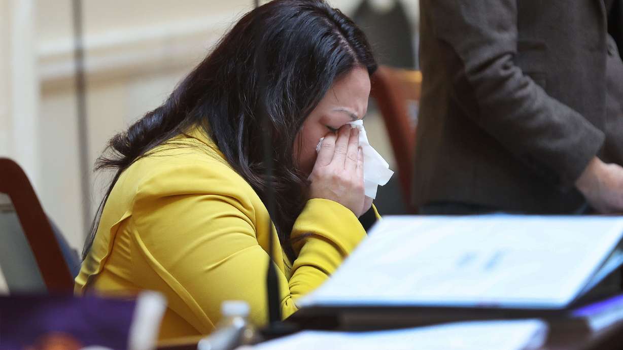 Sen. Luz Escamilla, D-Salt Lake City, cries during the voting on Friday, at the Capitol, for a bill that would ban transgender surgeries for Utah children and teens. Escamilla had just finished speaking to the Senate and voting against the bill.