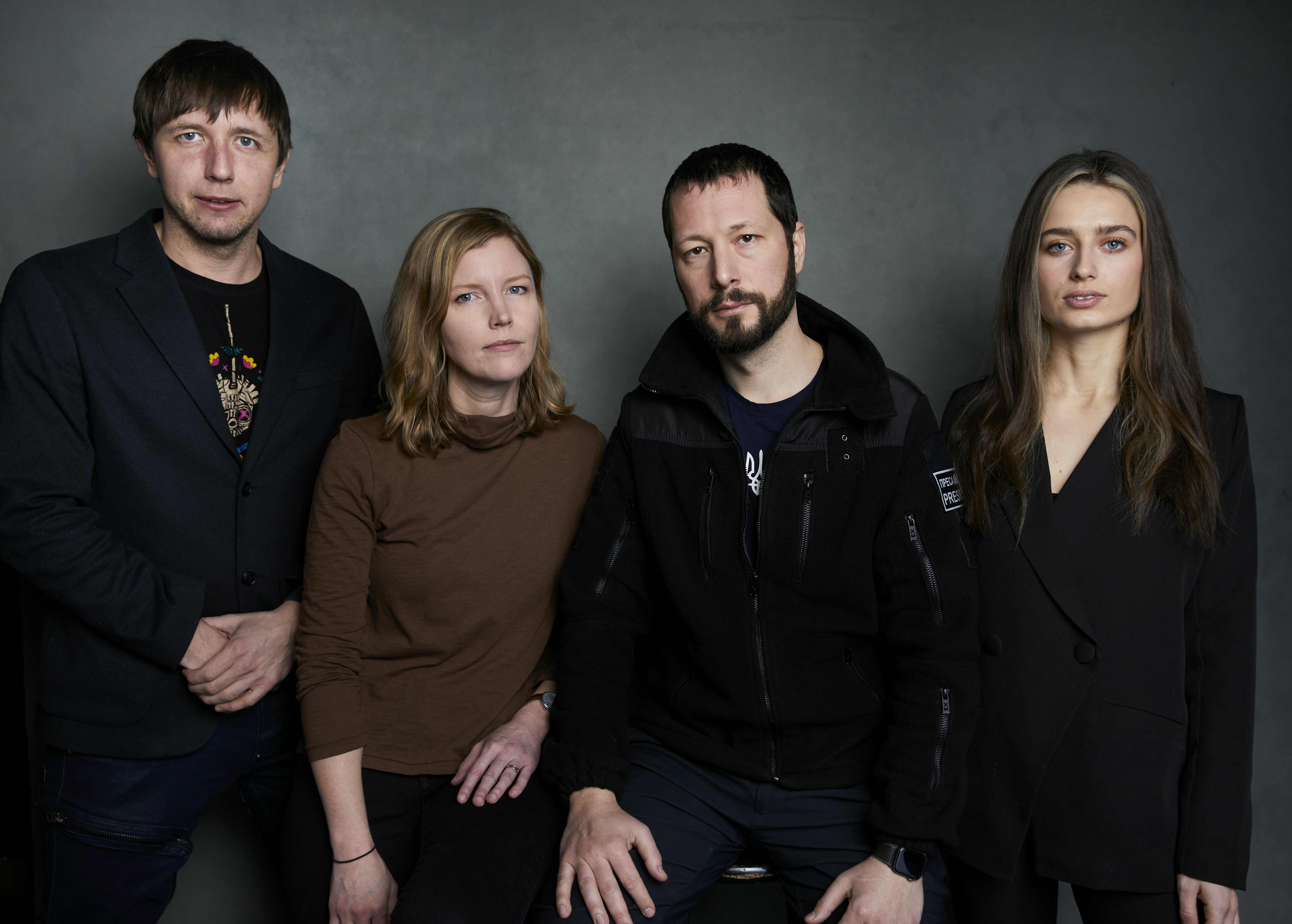 Photographer Evgeniy Maloletka, from left, "Frontline" producer/editor Michelle Mizner, director Mstyslav Chernov, and field producer Vasilisa Stepanenko pose for a portrait to promote the film "20 Days in Mariupol" at the Latinx House during the Sundance Film Festival on Sunday, in Park City.